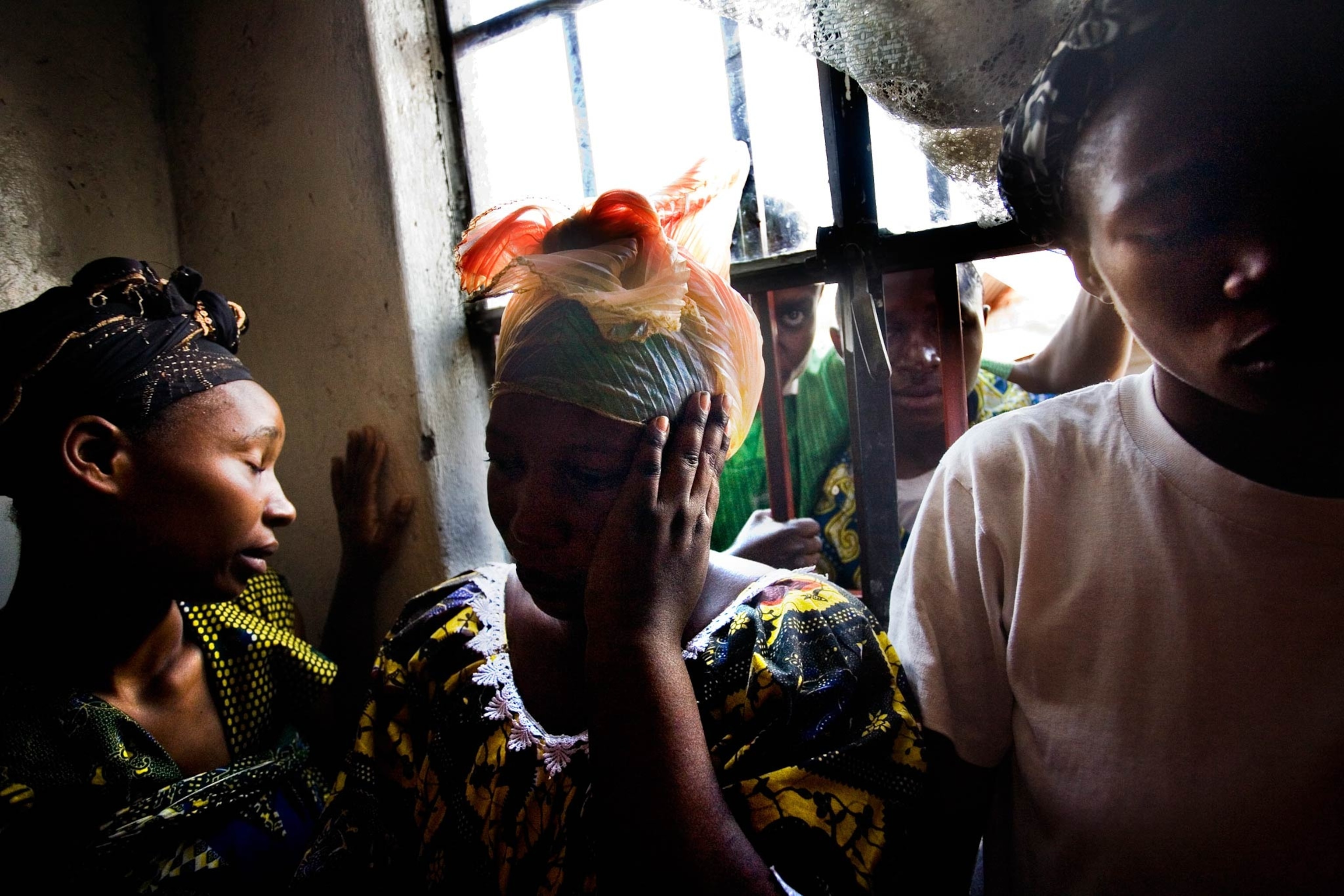 Congolese commandos celebrate as they advance up the mountainous road toward Bunagana, the last remaining stronghold of the M-23 rebels on Wednesday.(Pete Muller for the New York Times)