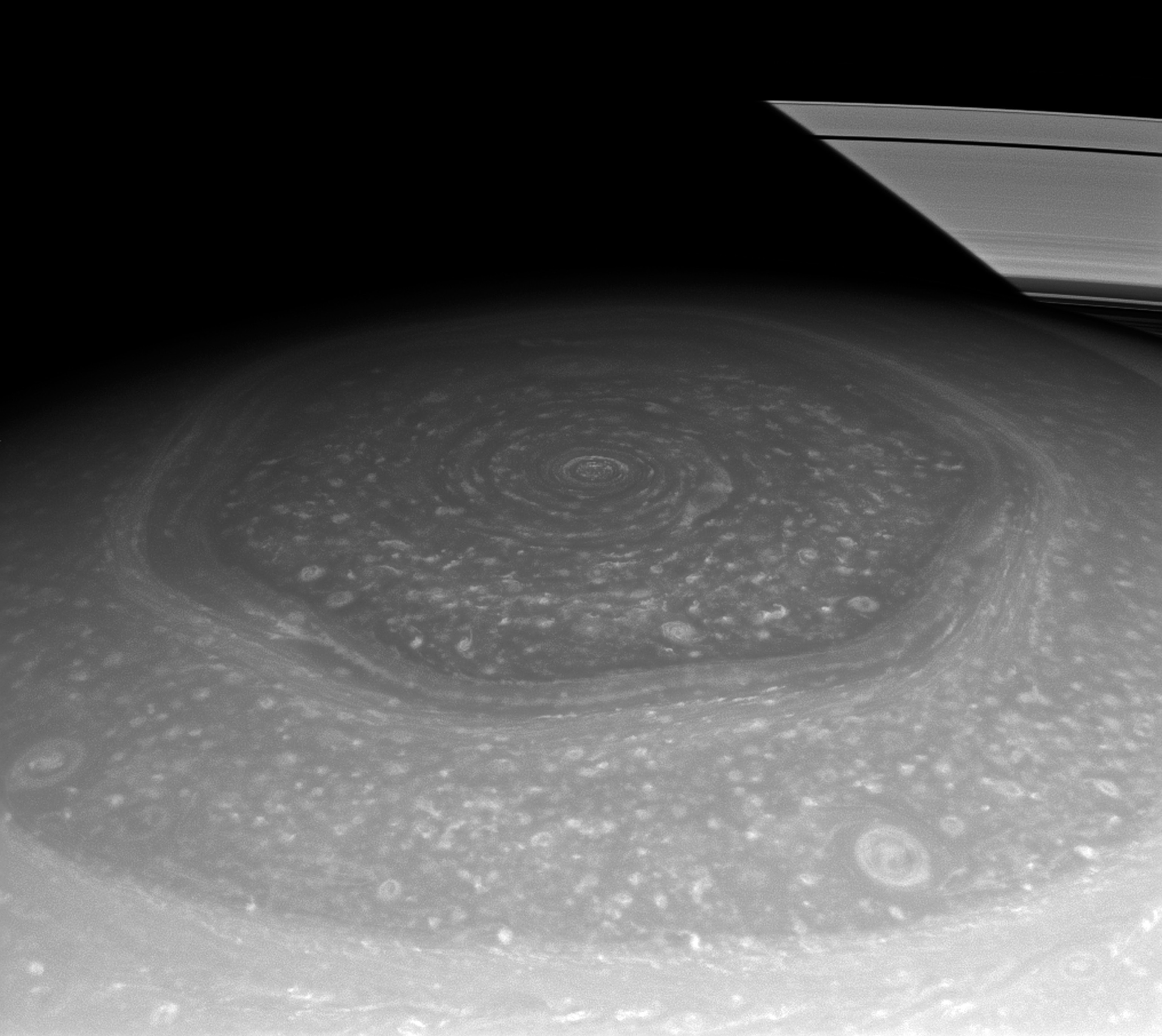Saturn's hexagonal north pole during spring