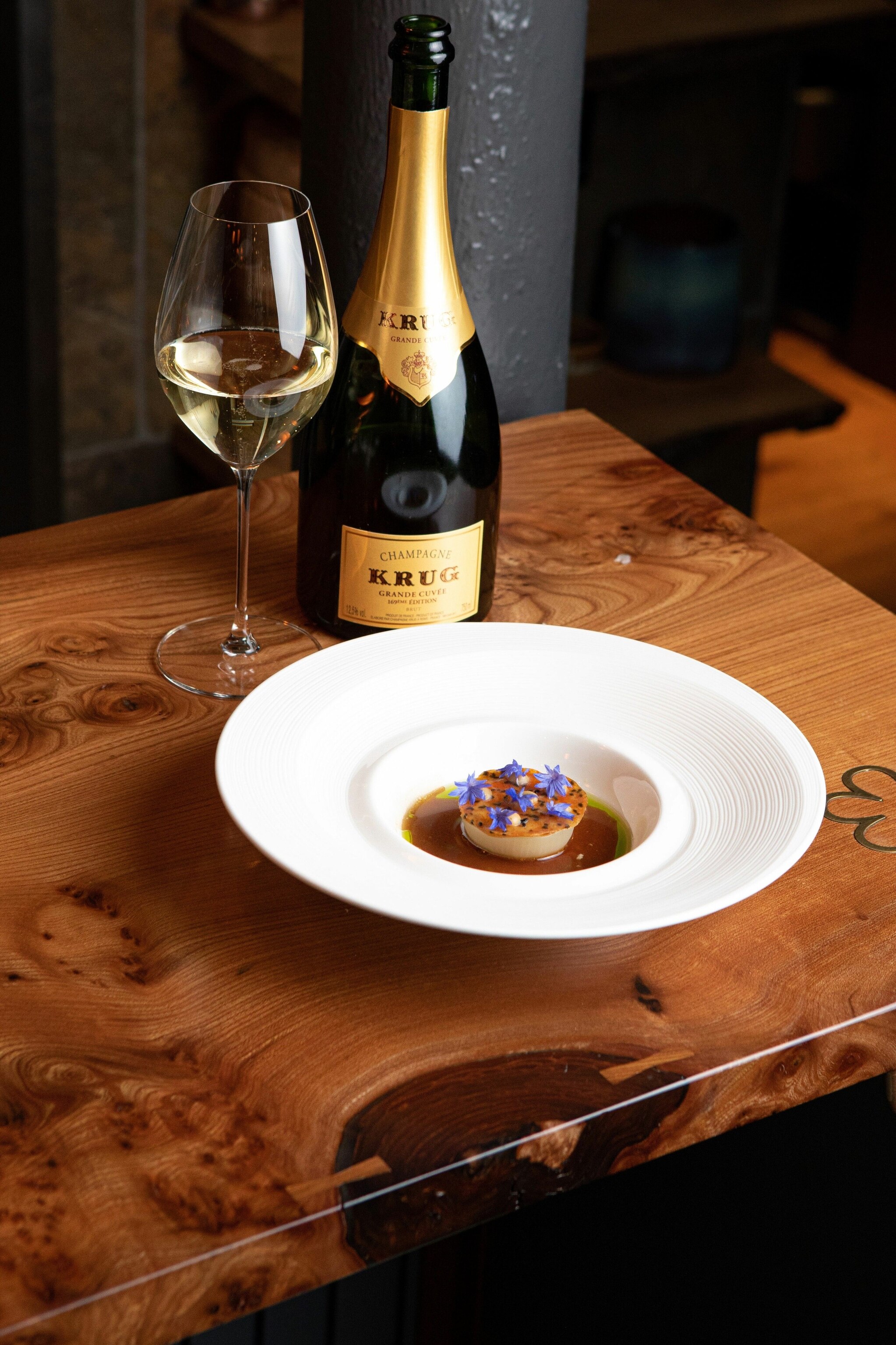 Smoked eel with Roscoff onion, Old Winchester cheese and King’s oscietra caviar at Cail Bruich.