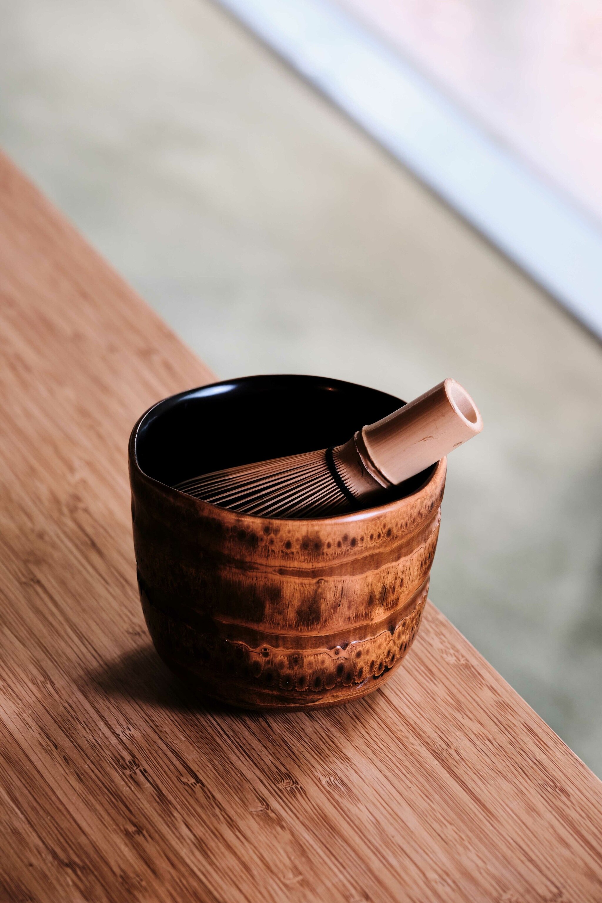 A small bowl used for tea leaves.