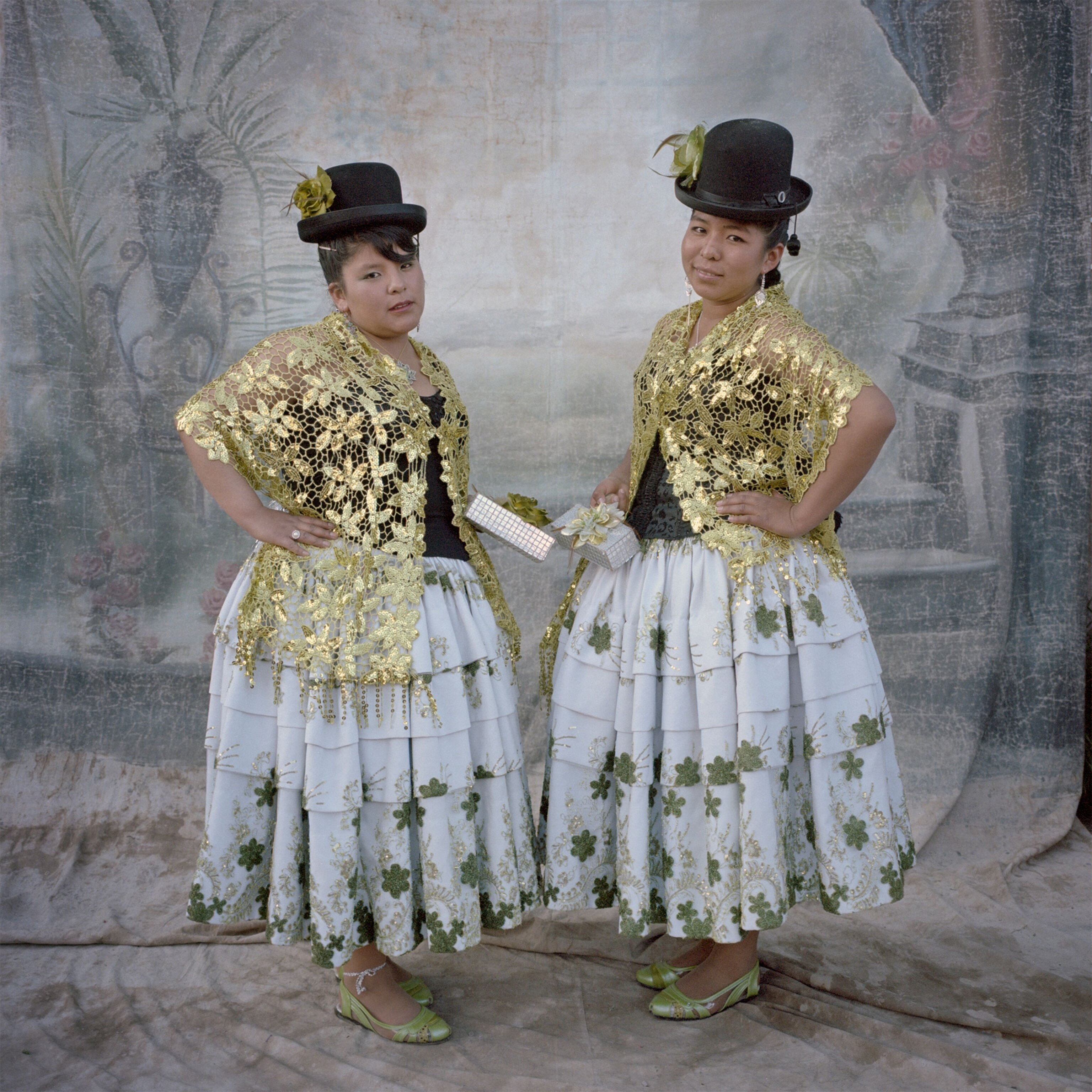 two women in costume during the Candelaria Festival in Peru
