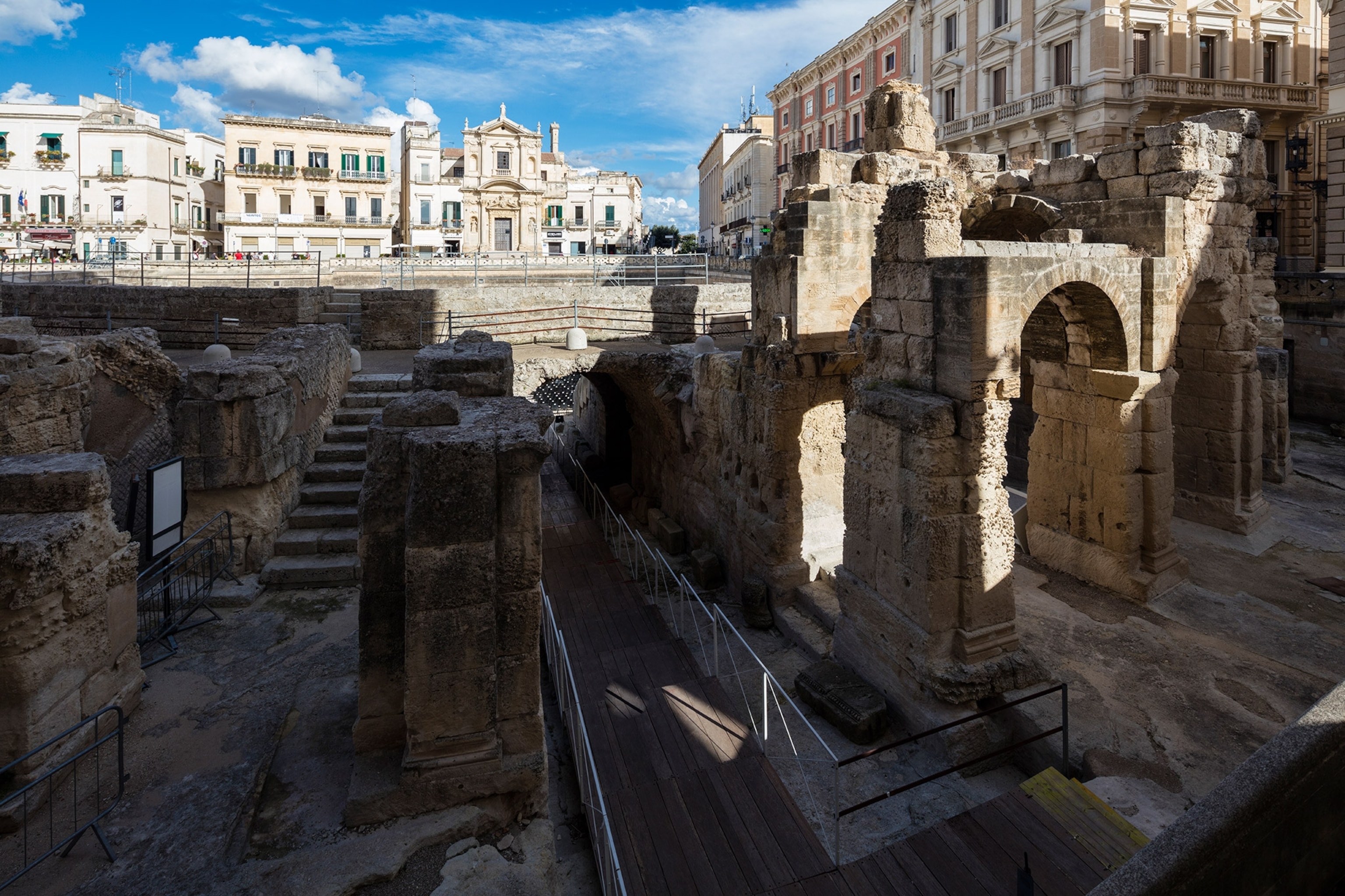 Ancient buildings and Roman ruins in the old town of Lecce, Italy