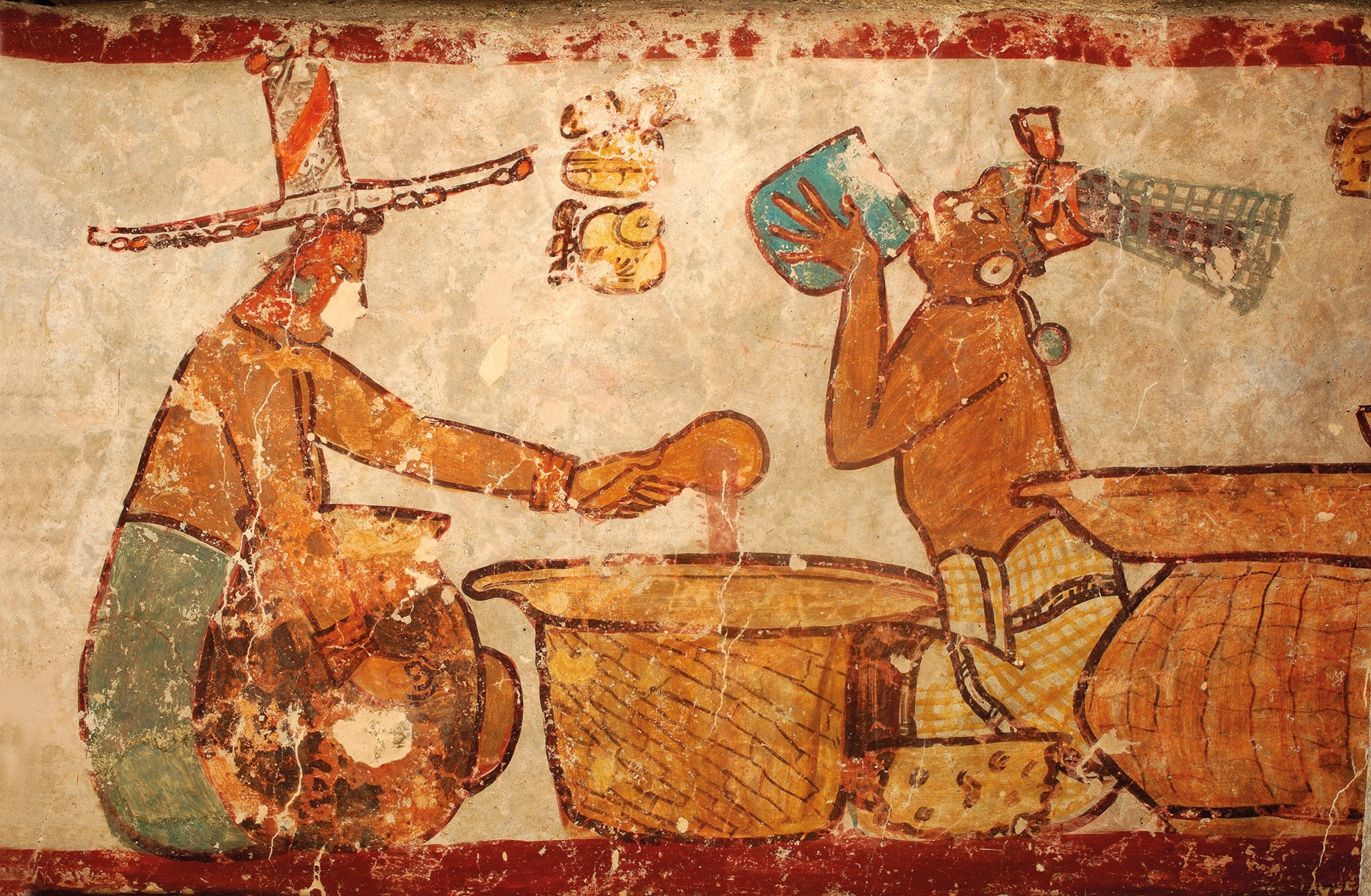 A seated person with a large pot wears a tall, wide-brimmed hat and pours liquid.