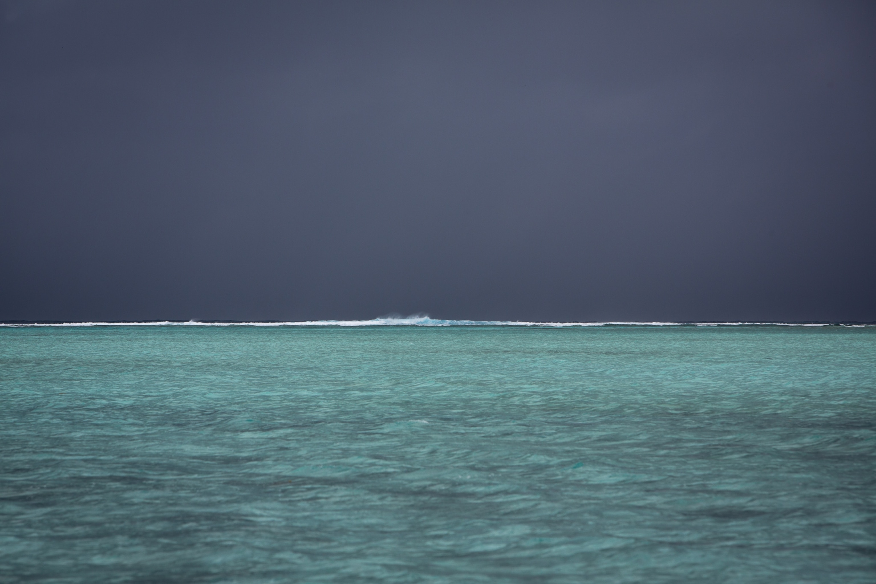 Waves break on the reef crest. Palmyra Atoll.
