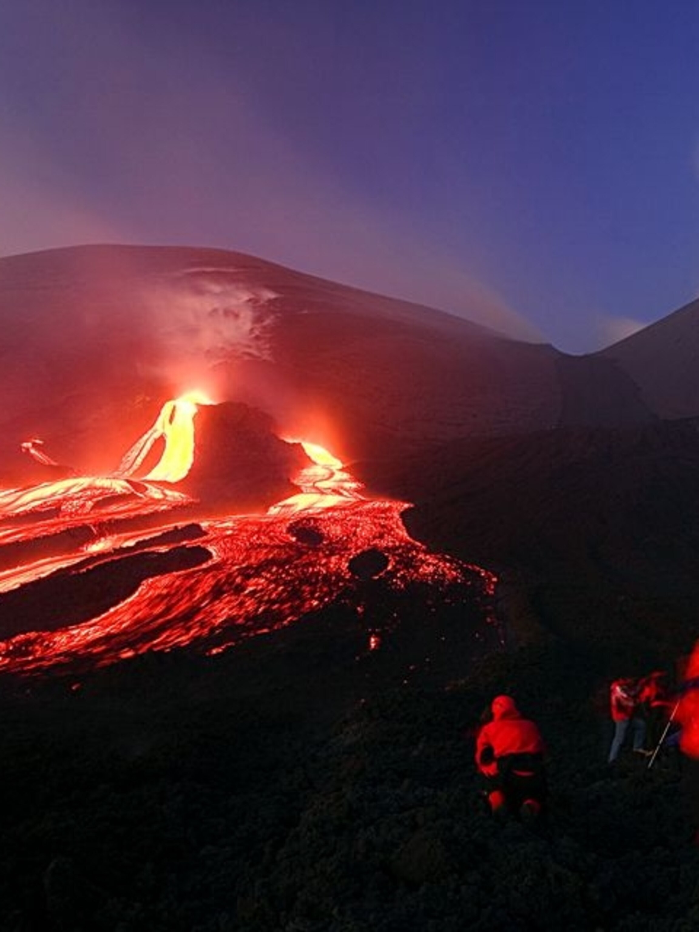 Witness the Fiery Spectacle: Etna and Stromboli Volcanoes Erupting in Italy - Reflecting on the awe-inspiring nature of these natural phenomena