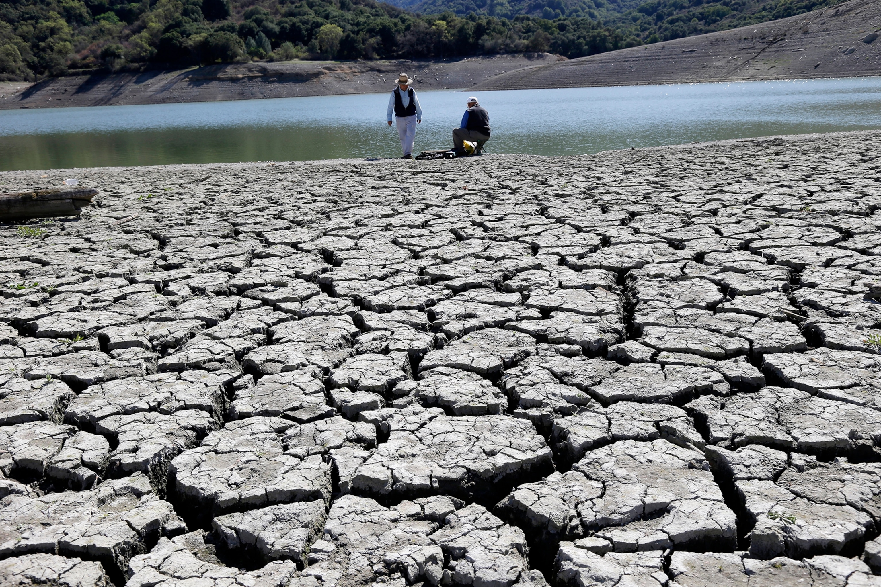 The dry bed of the Stevens Creek Reservoir is seen on Thursday, March 13, 2014, in Cupertino, Calif.