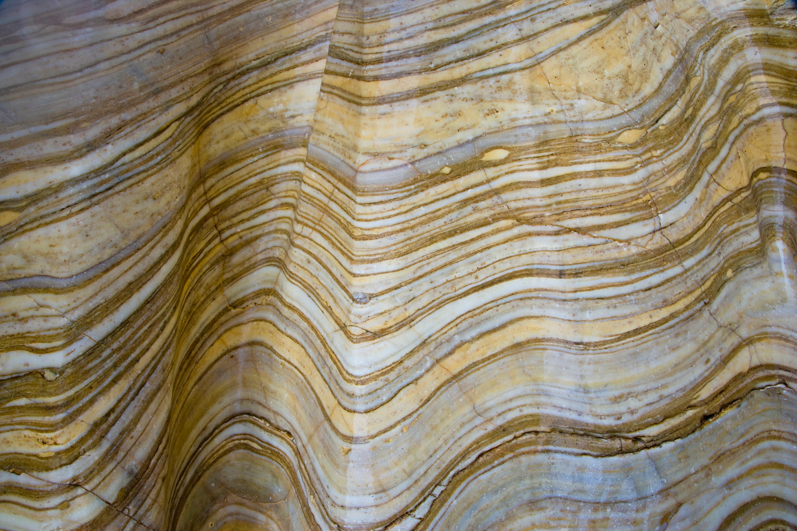 An unclose photo of beige colored marble rock within Death Valley National Park