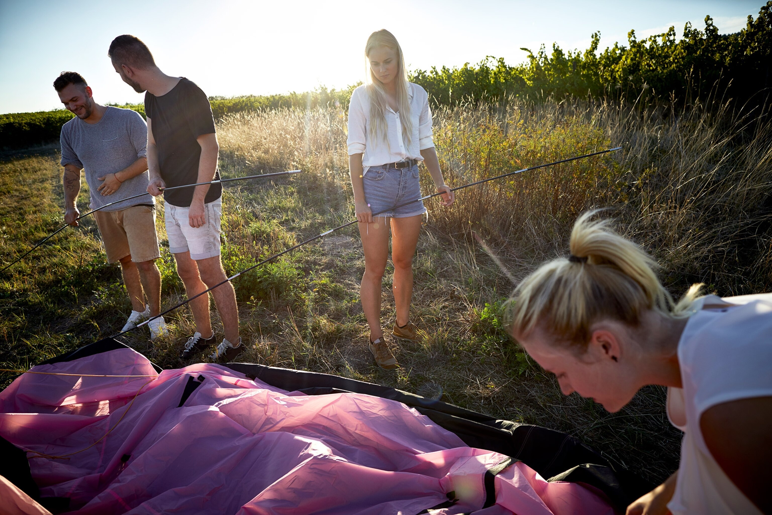 friends putting together a tent