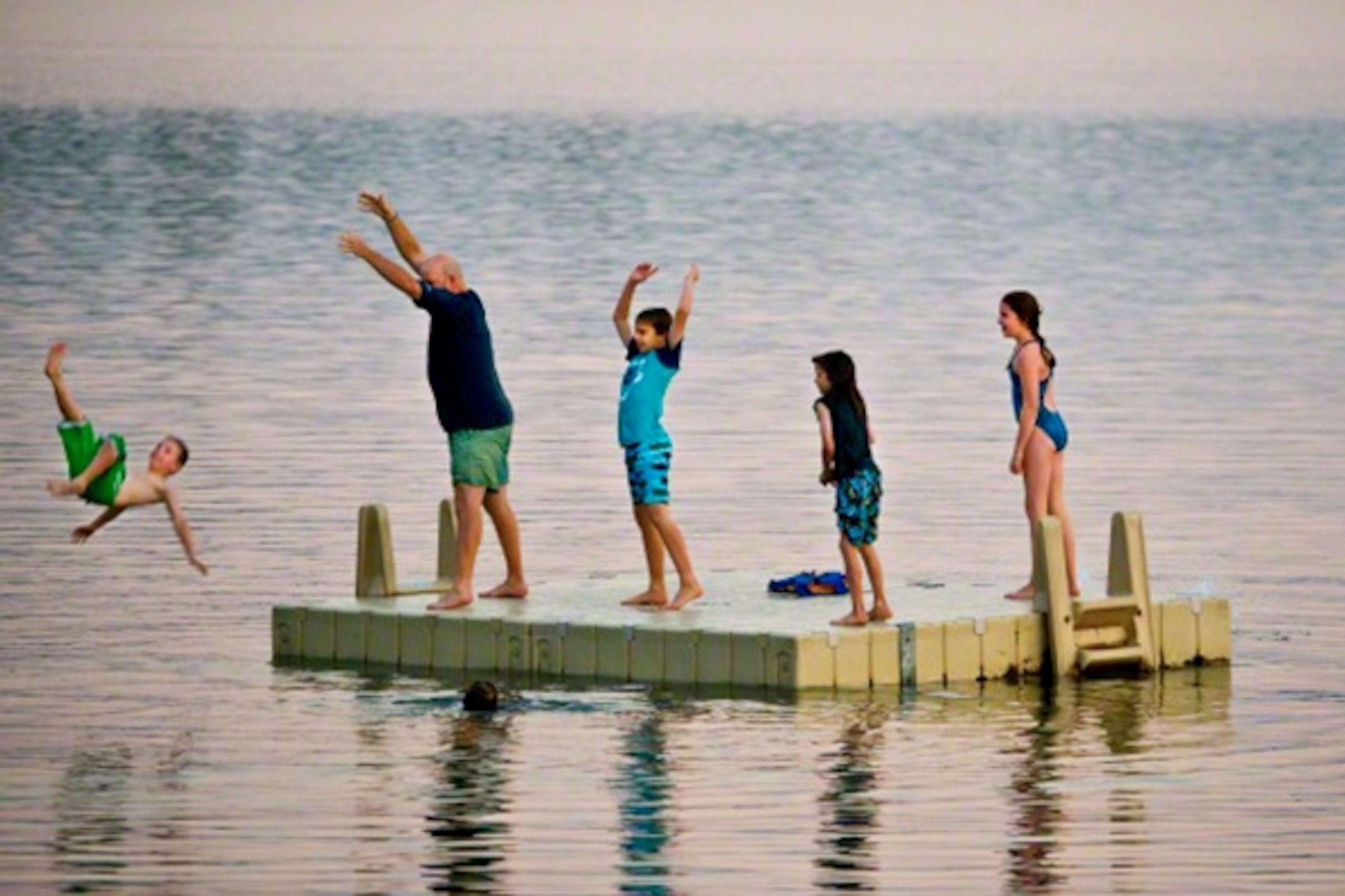 A family cools down on Lake Harriet. (Photograph by Layne Kennedy / Corbis)