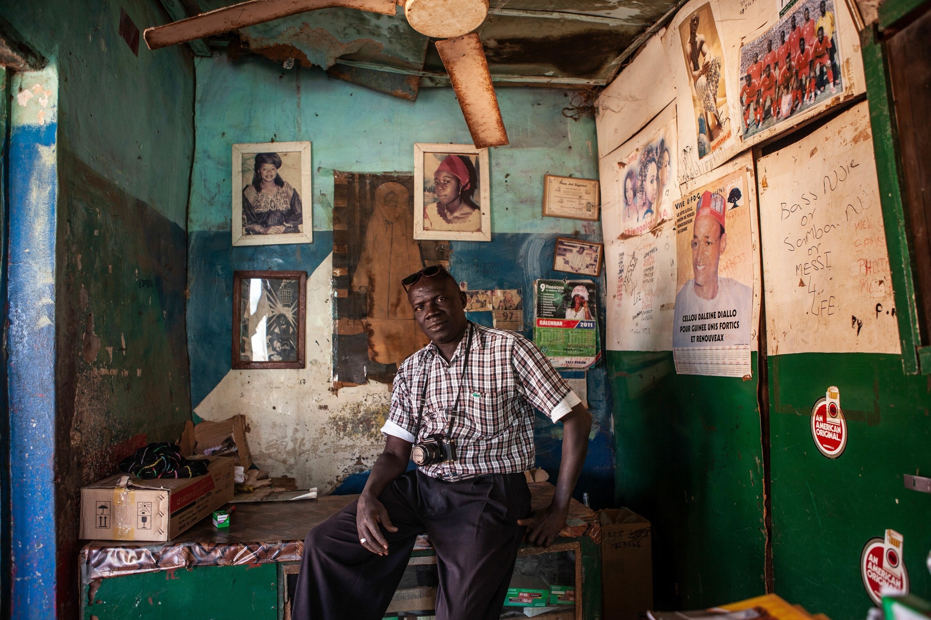 Basero Njie, a second-generation photographer, in his studio in Bansang town.