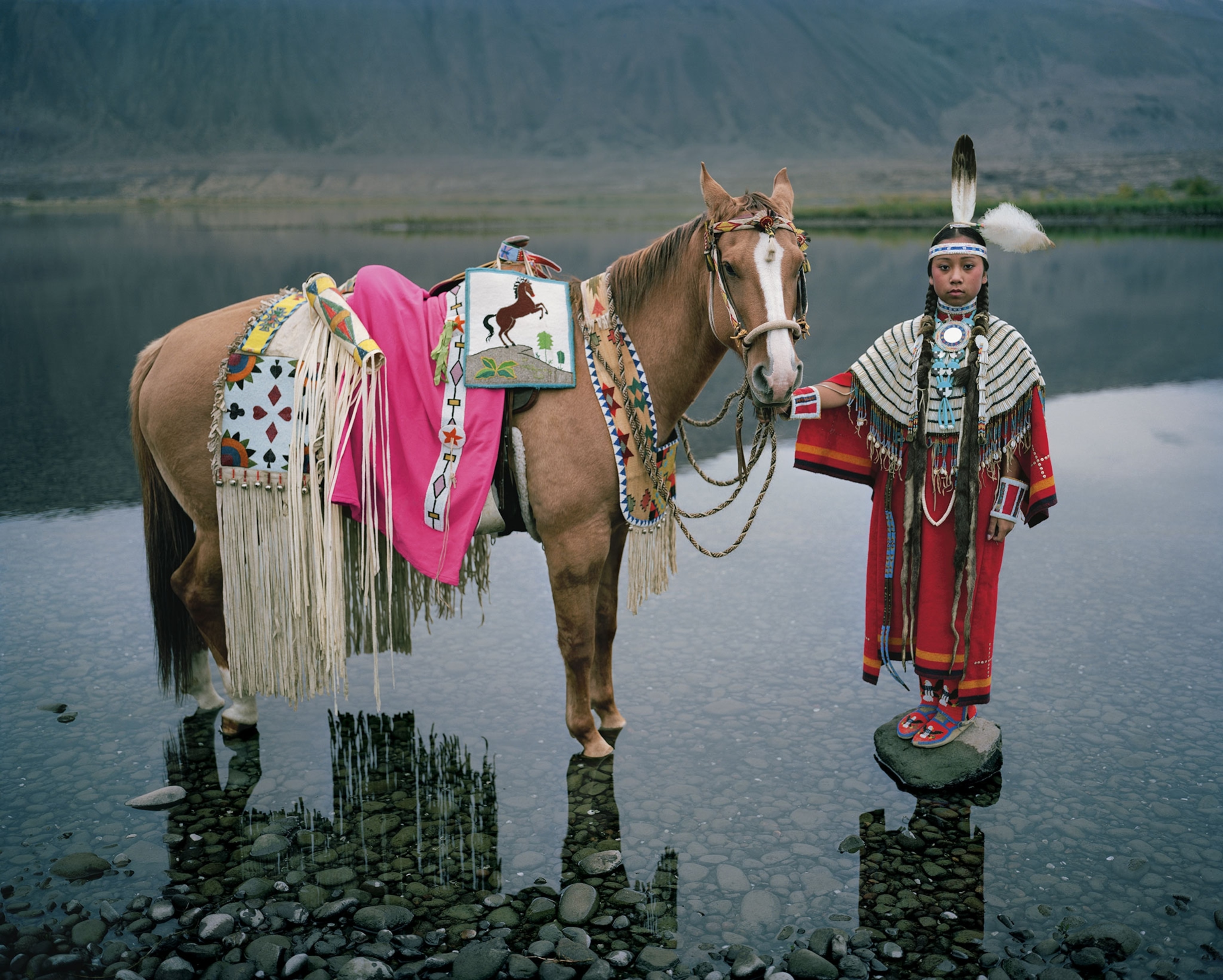 Destiny Buck, of the Wanapum tribe, rides her mare, Daisy, in the yearly Indian princess competition in Pendleton, Oregon. Embraced first for war, hunting, and transport, horses became partners in pageantry and a way to show tribal pride.