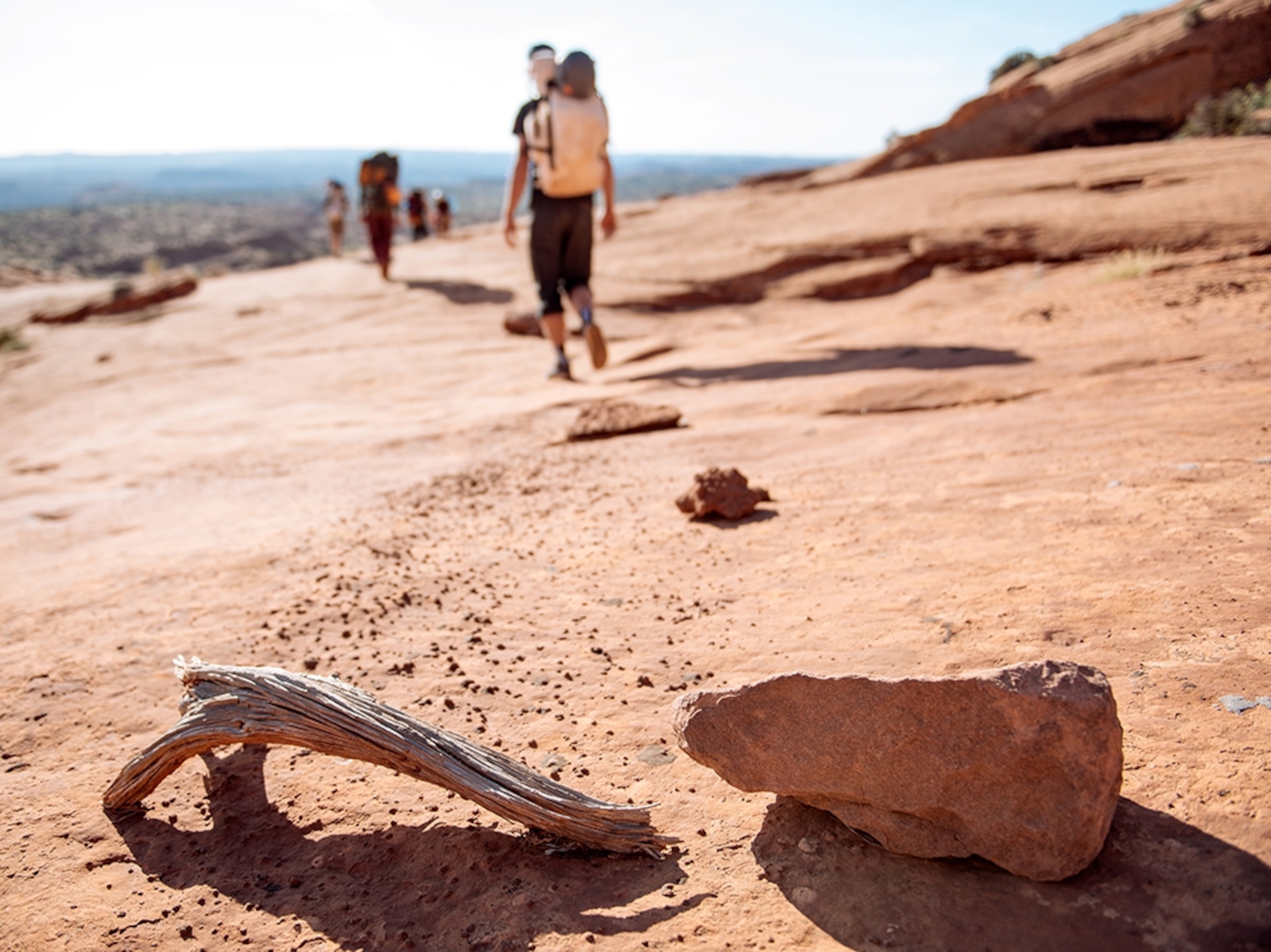 hikers trekking in Utah.