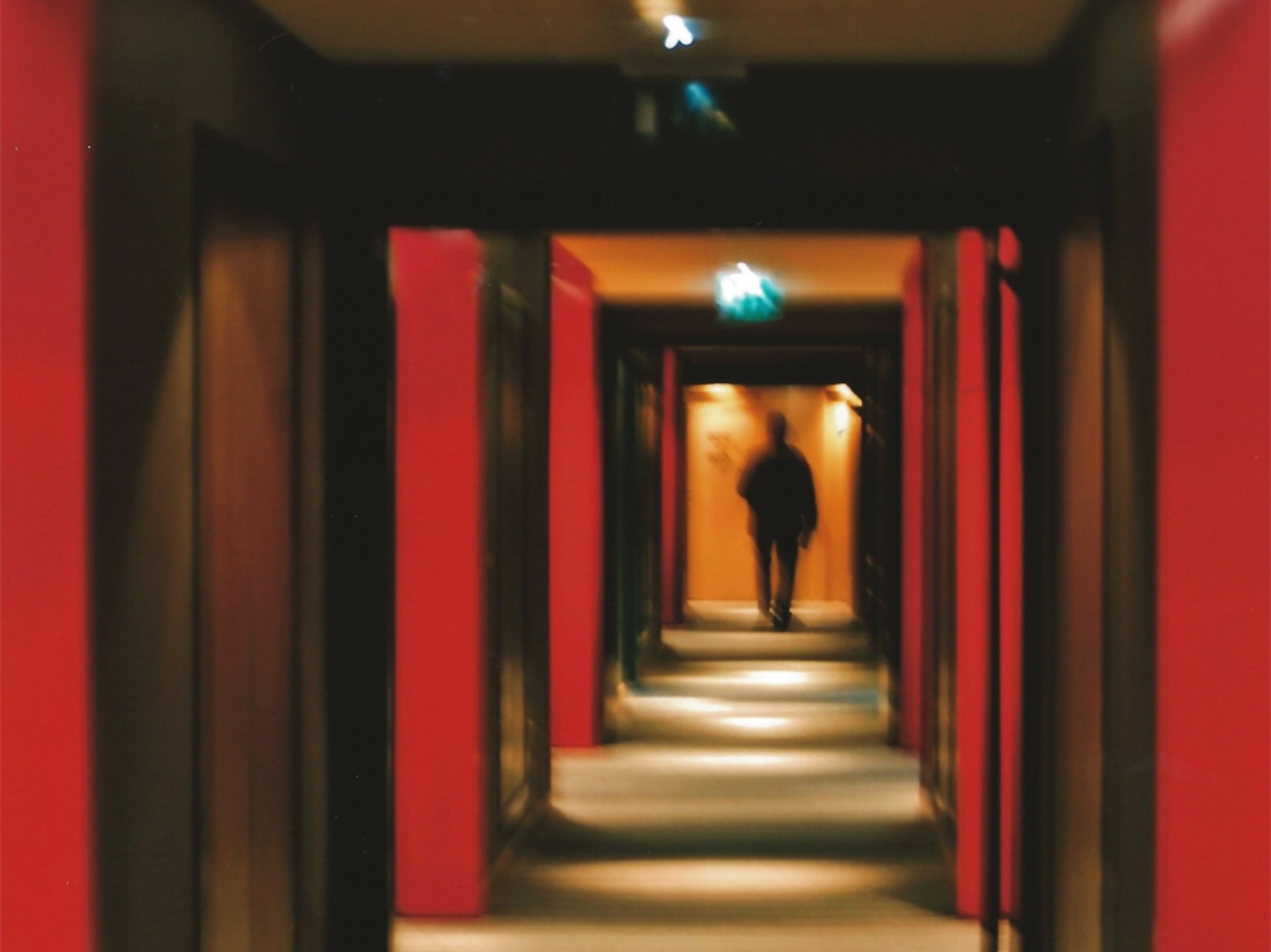 Person in hotel hallway