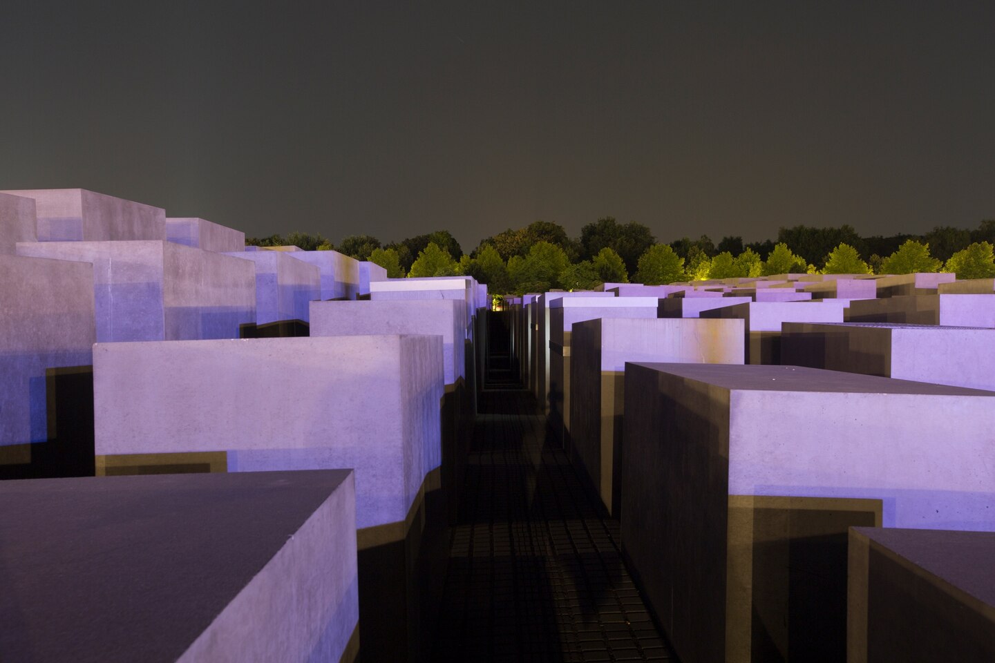 Photo of Holocaust memorial filled with grave like bricks of varying sizes