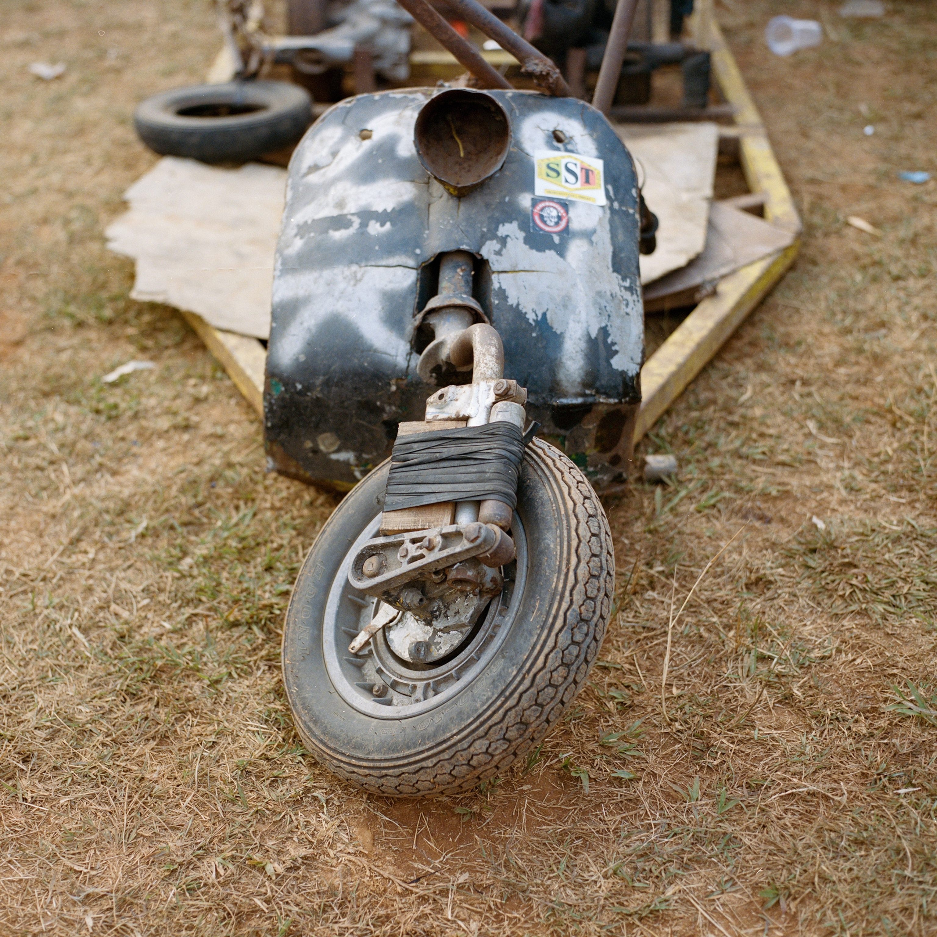 a wheel on a low-rider vespa at Java Rosok Extreme in Indonesia