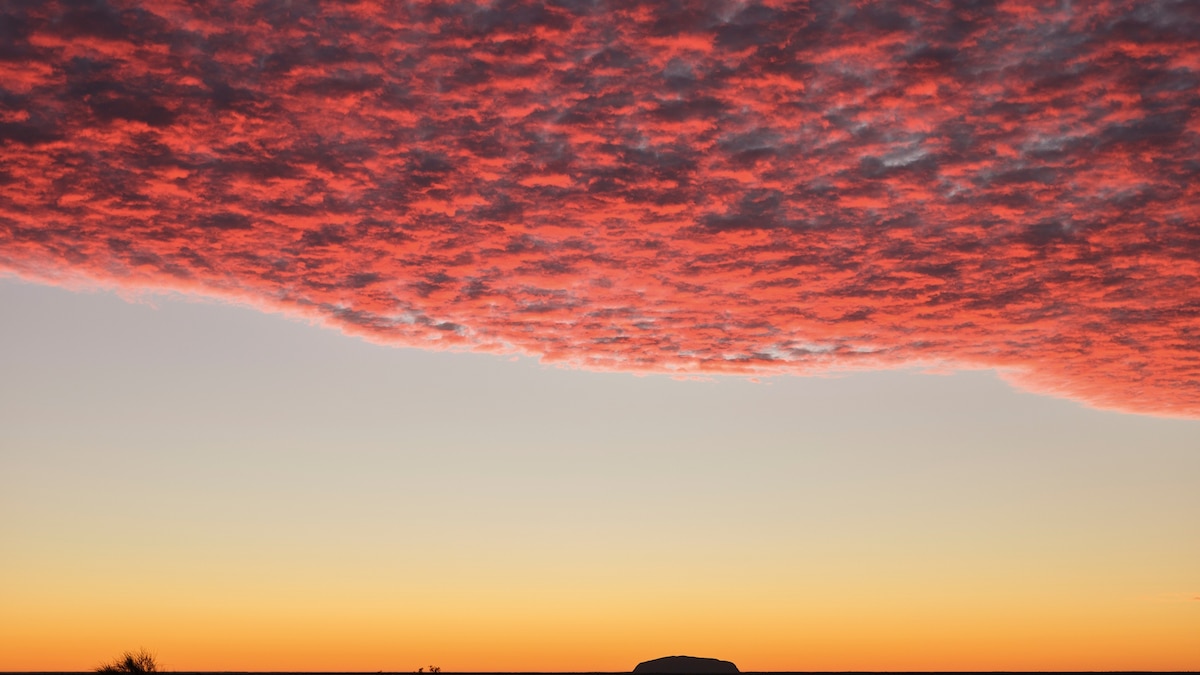 This new Walk in Australia's Red Centre Lets Travelers Sleep in the Shadow of Uluru