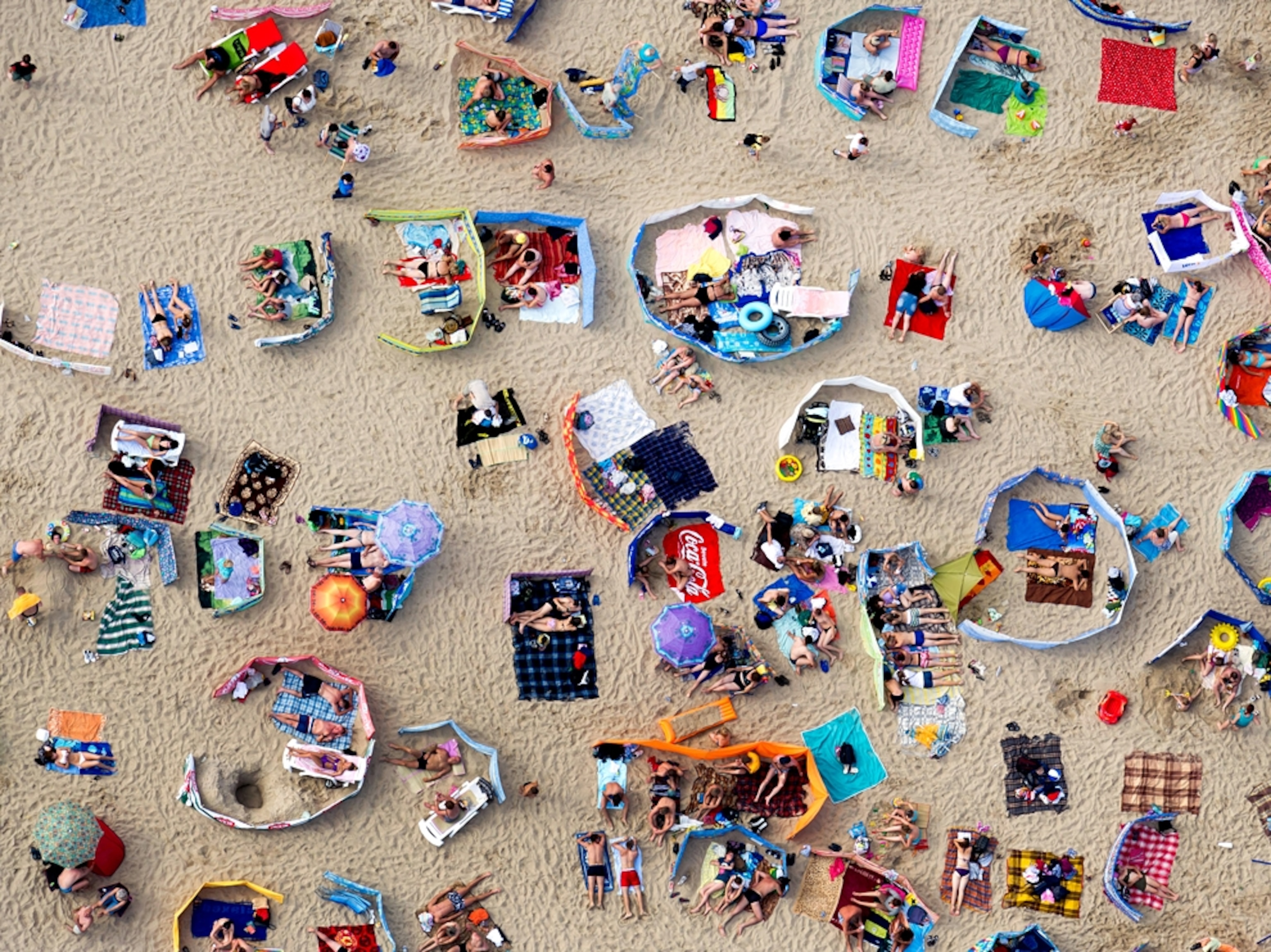 people relaxing on a beach in Wladyslawowo, Poland