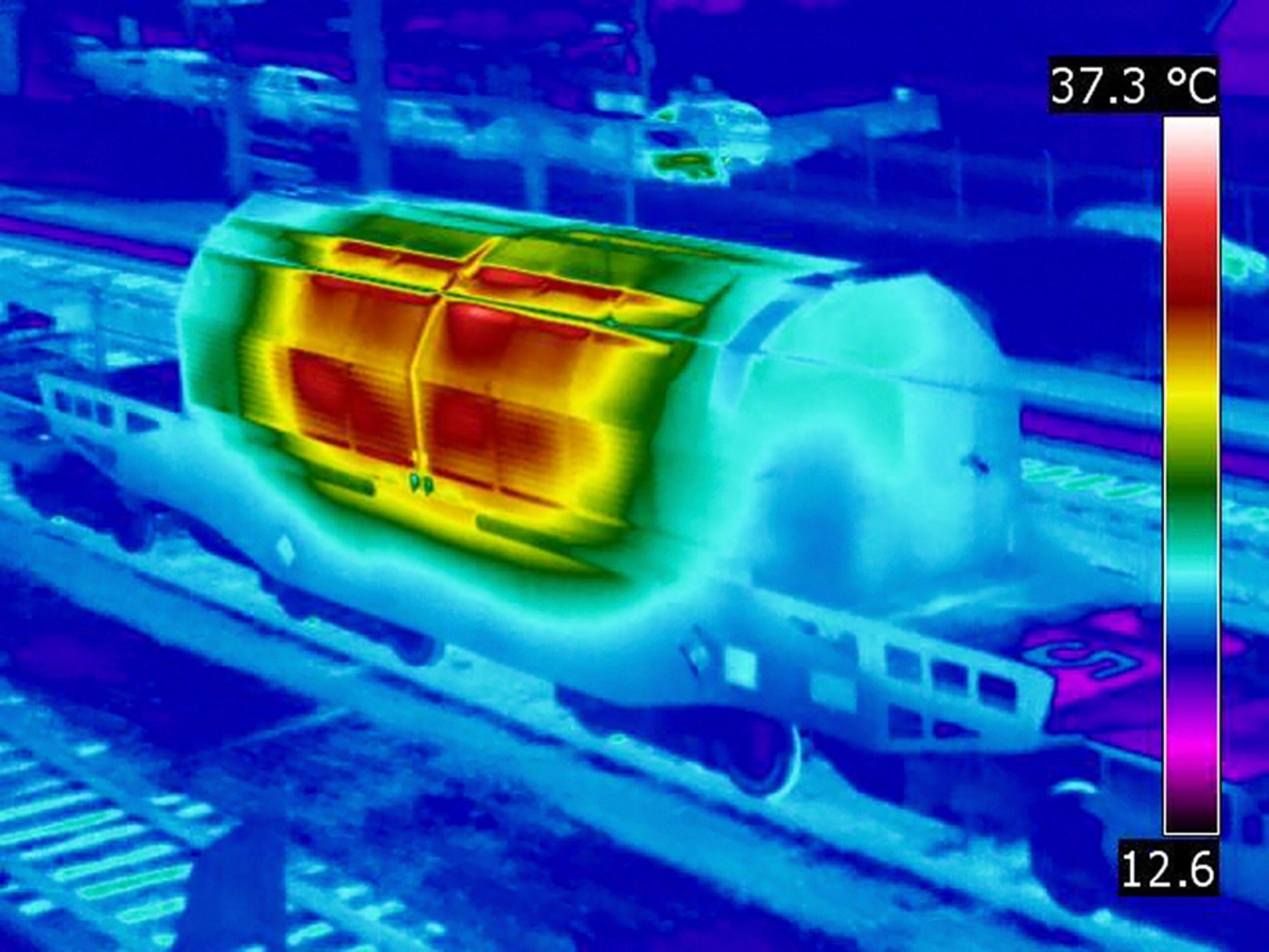 A thermal image of a nuclear-waste train, with warm contents, glowing red (picture)