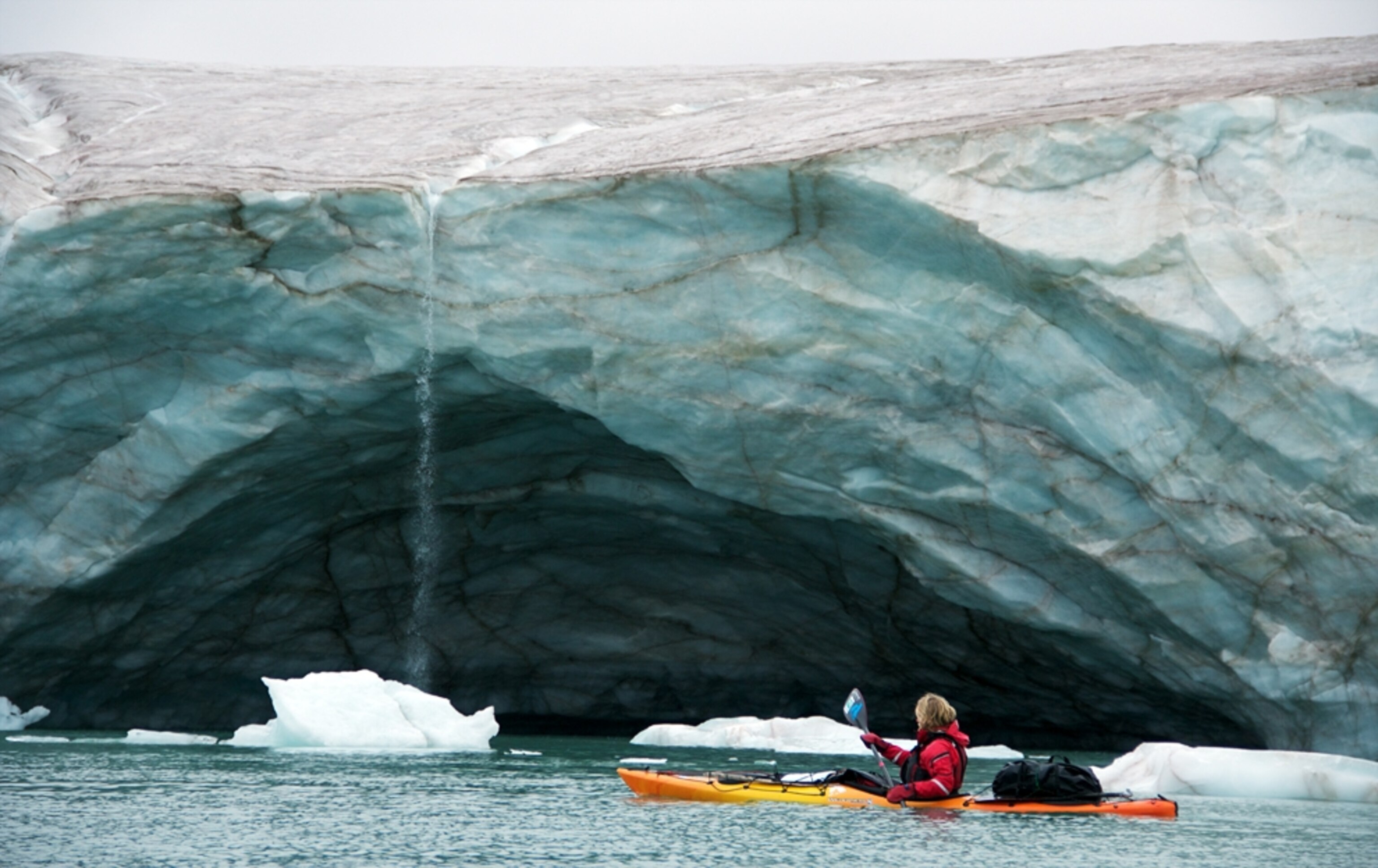 Erik Boomer kayaks near glaciers on the east coast of Ellesmere Island, in British Columbia.