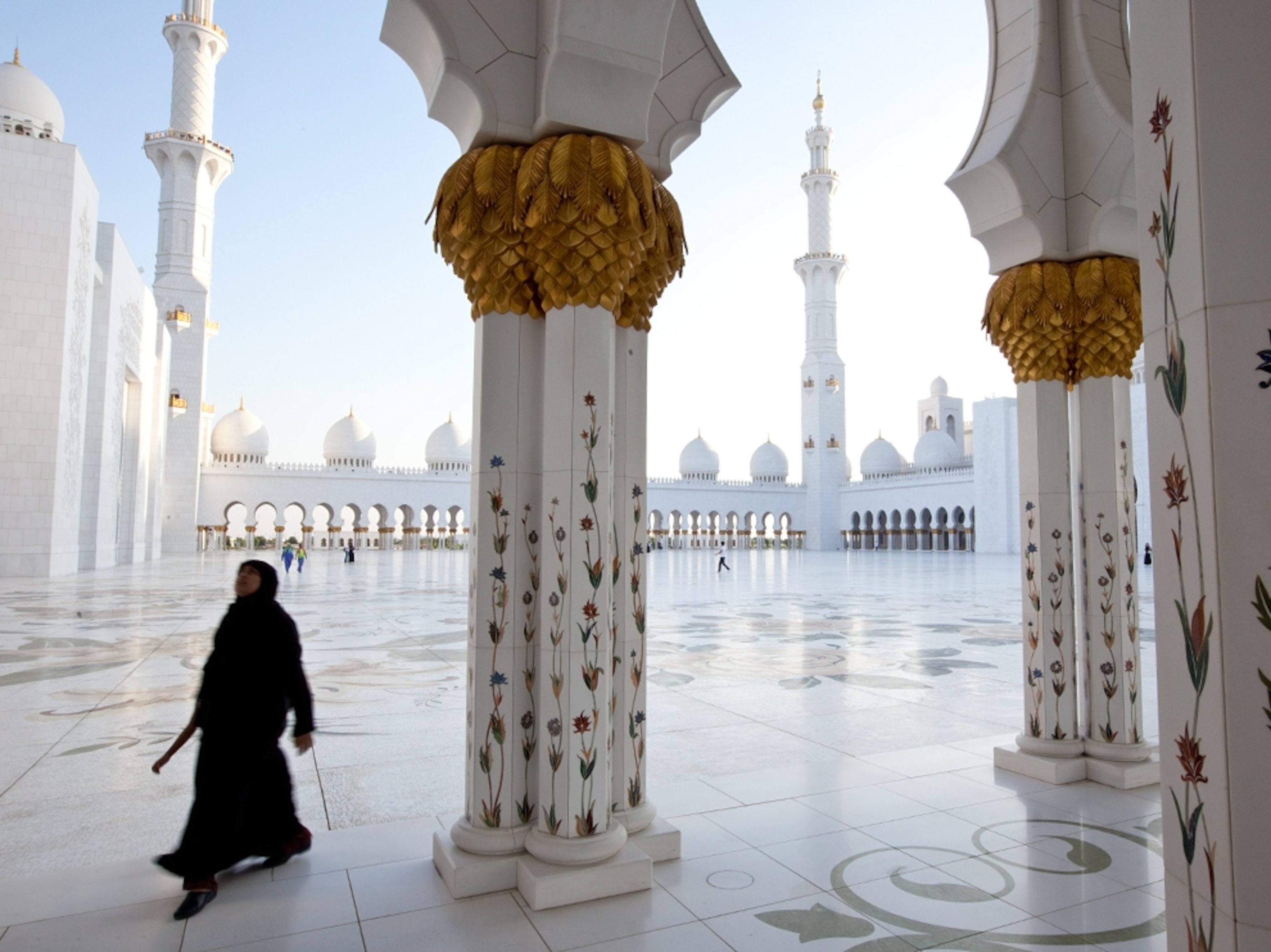 Woman in the courtyard at the Sheik Zayed Mosque in Abu Dhabi