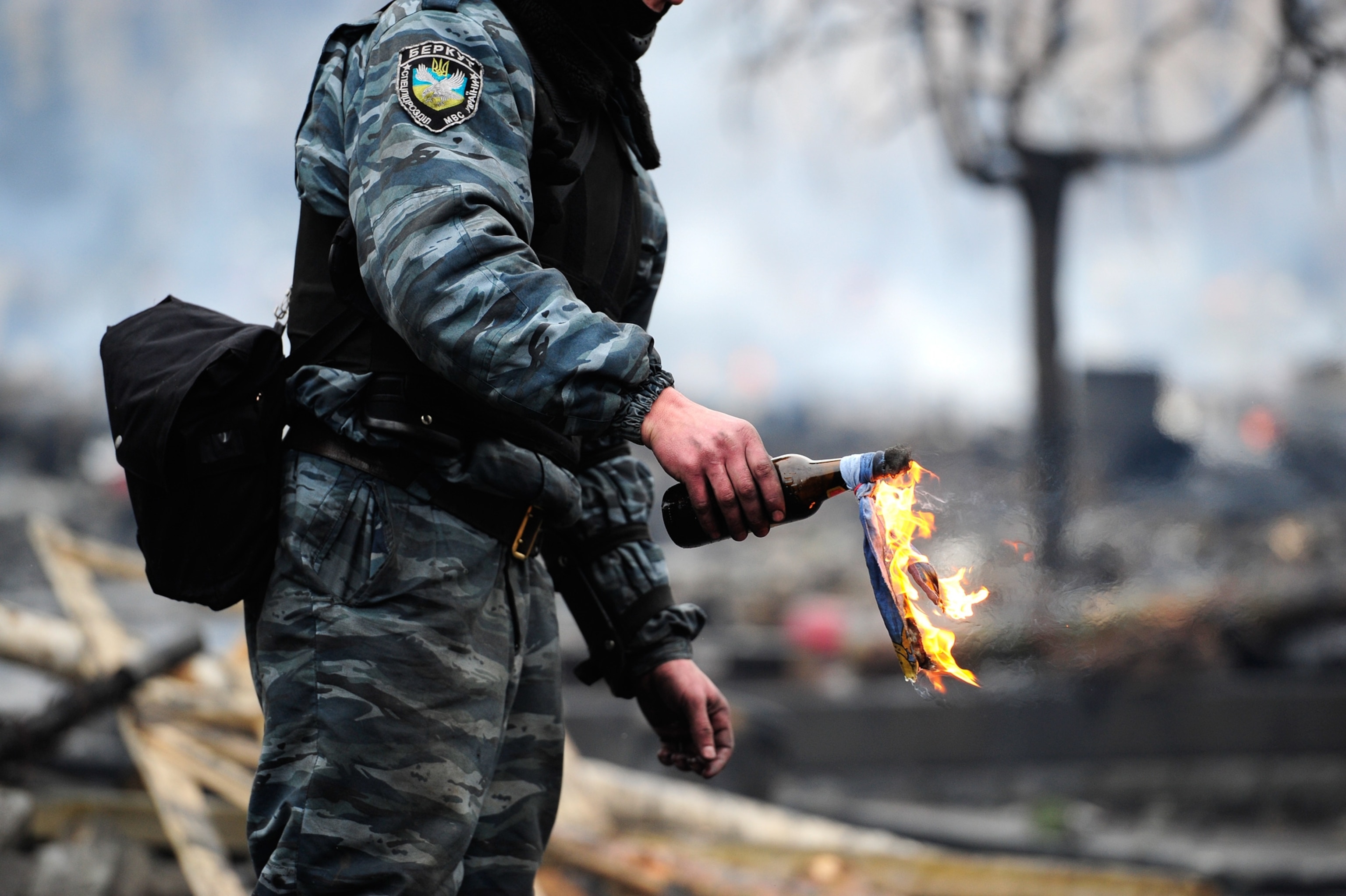 Anti-government protesters clash with riot police.