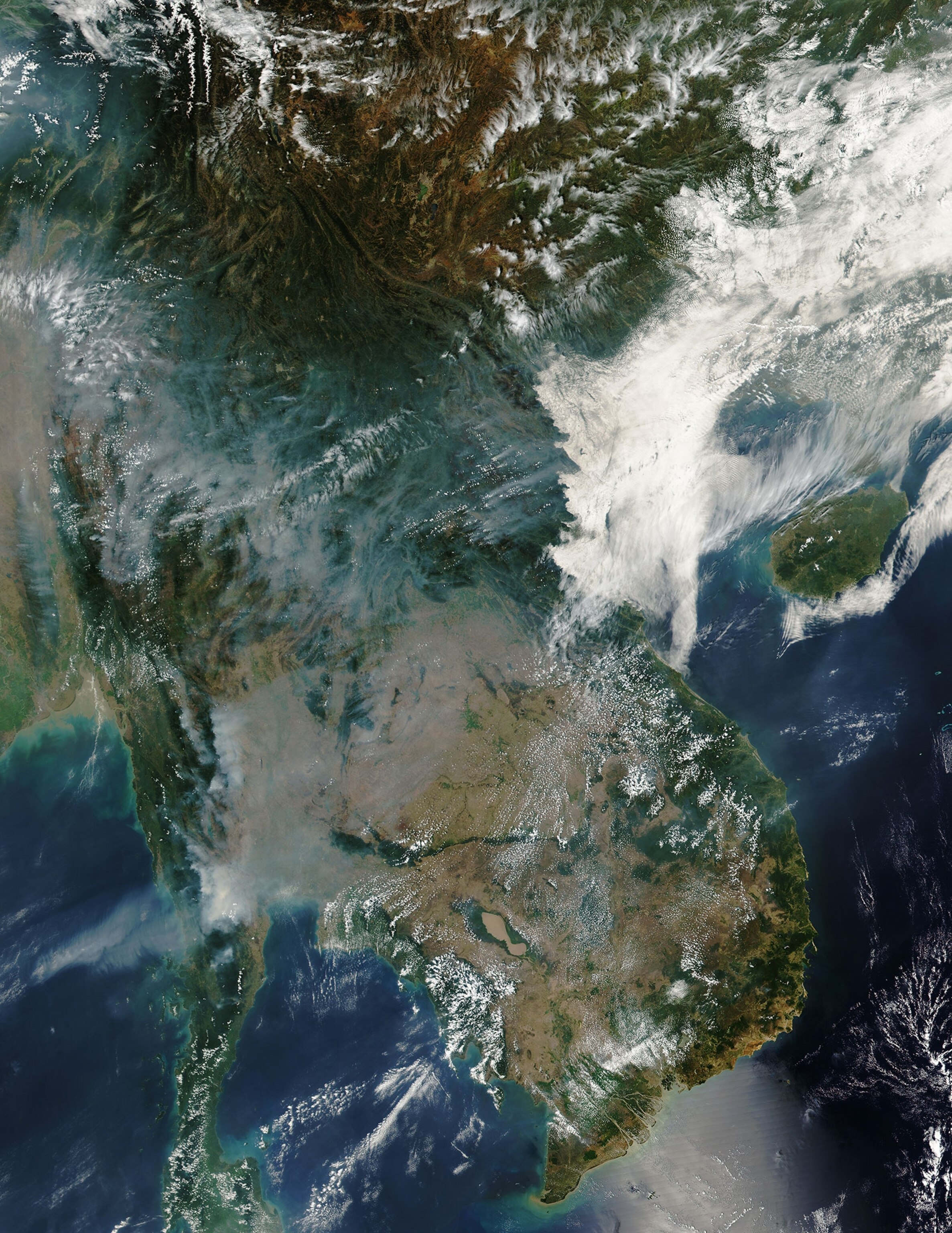 smoke and clouds above Indochina