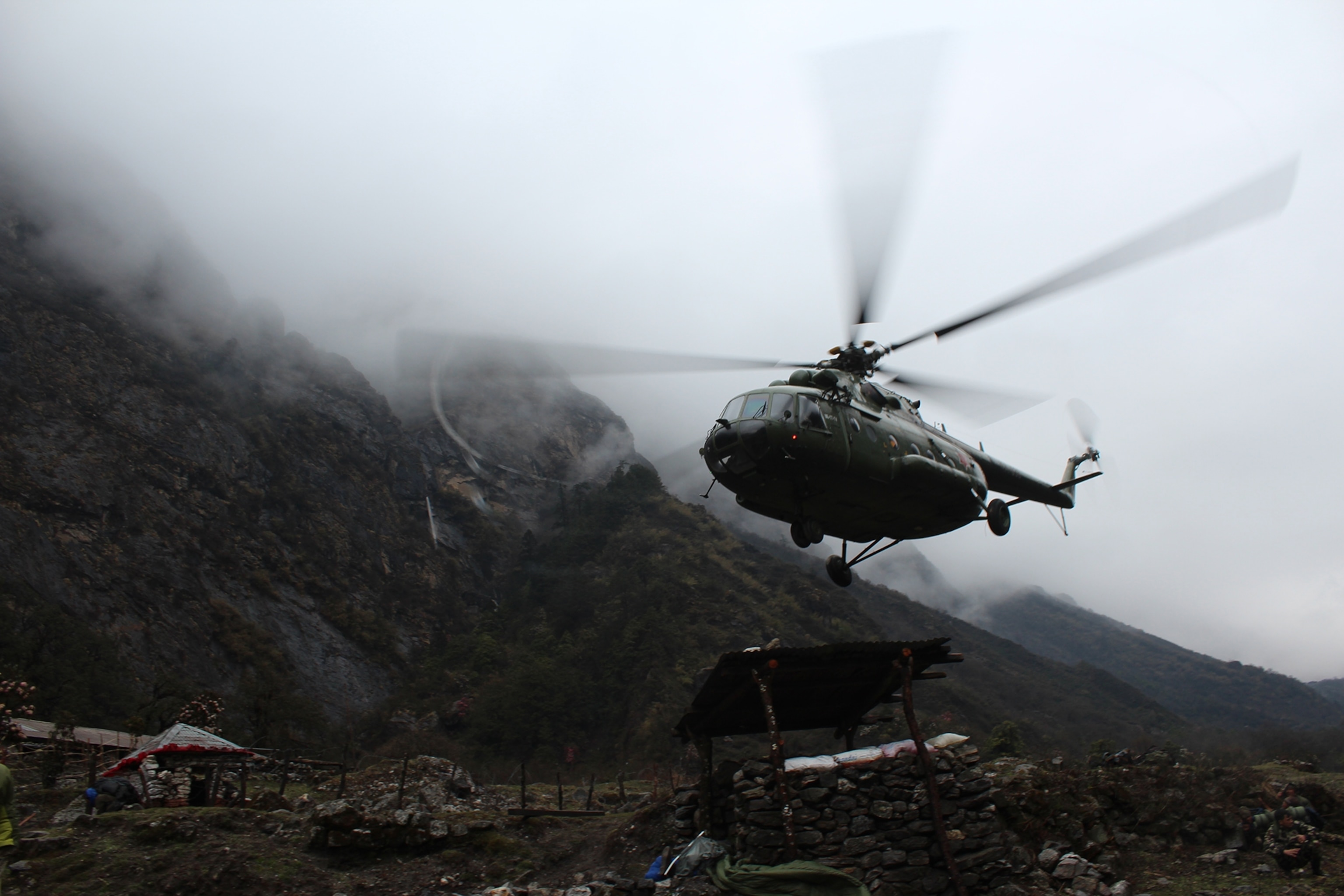 A Nepal Army helicopter lands at Godhatabela to evacuate the injured