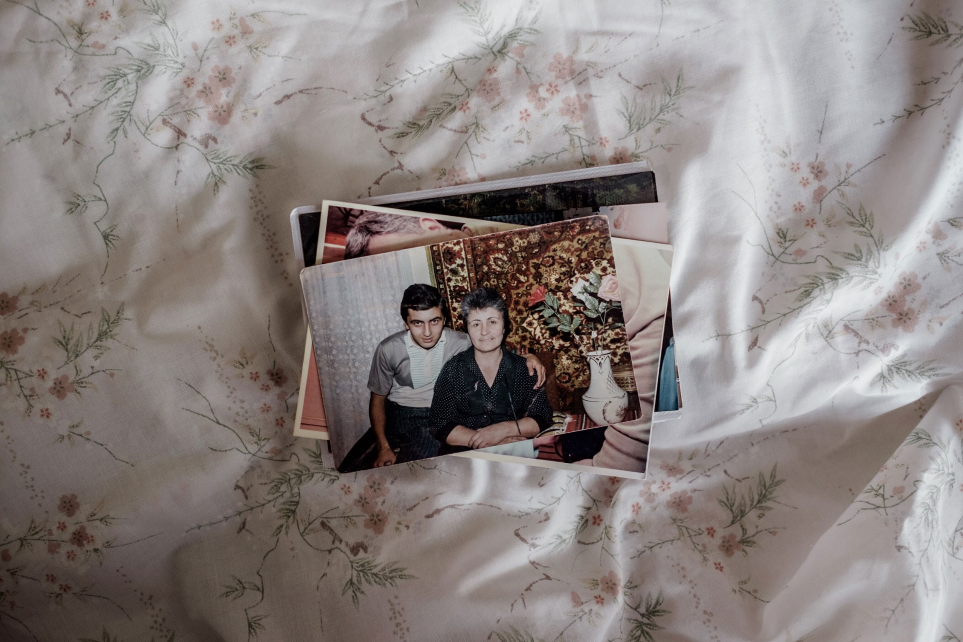 a family photo of Larissa with one of her three sons