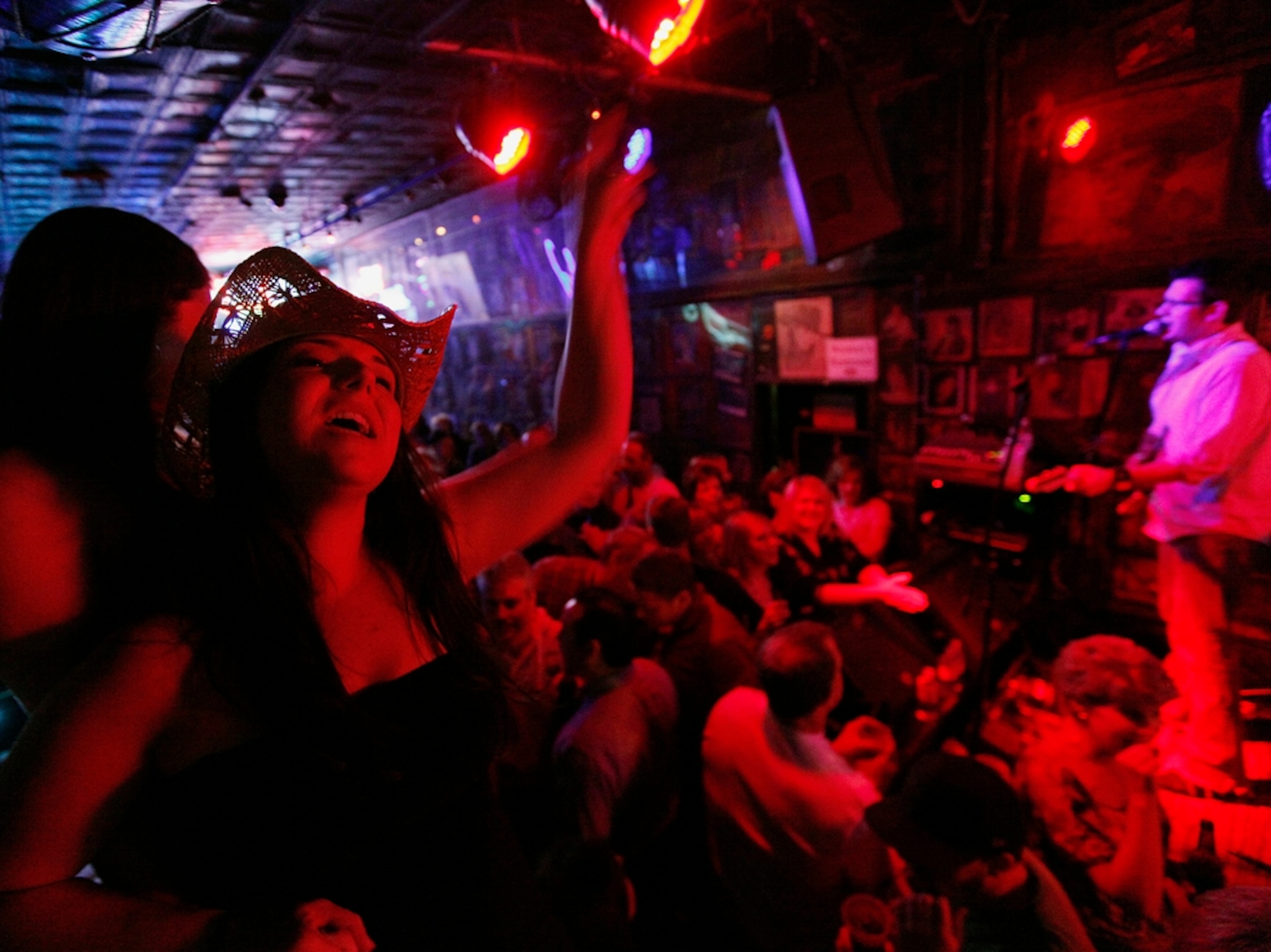 two women dancing on the bar at Tootsie's Orchid Lounge, Broadway Avenue, Nashville