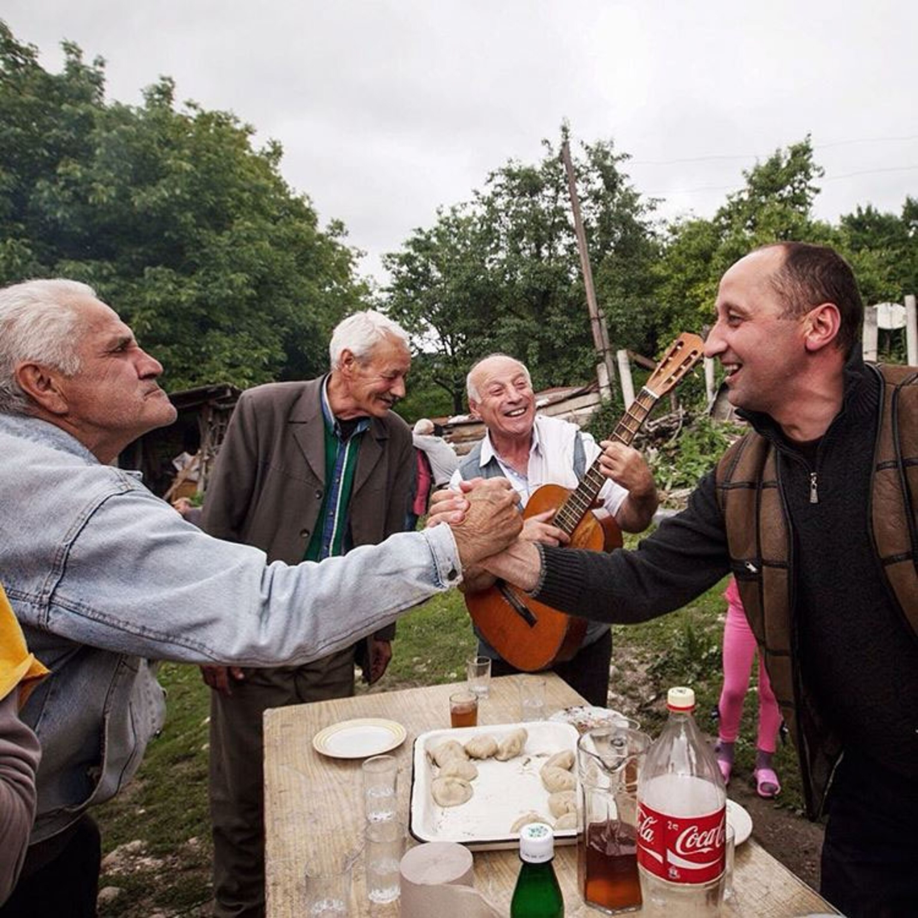 Georgian men sharing a meal