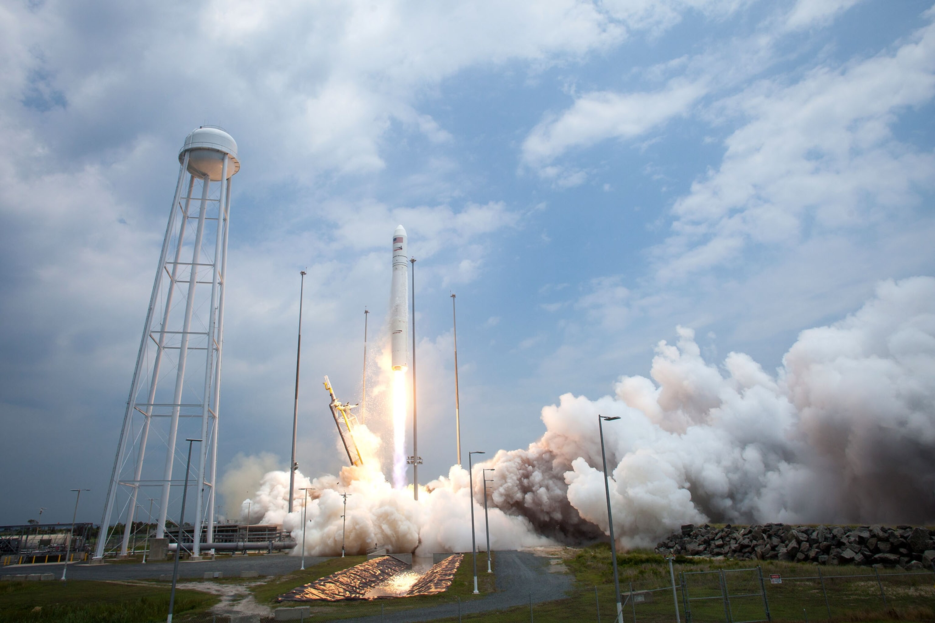 The Orbital Sciences Corporation Antares rocket launches from Pad-0A with the Cygnus spacecraft onboard, Sunday, July 13, 2014, at NASA's Wallops Flight Facility in Virginia.