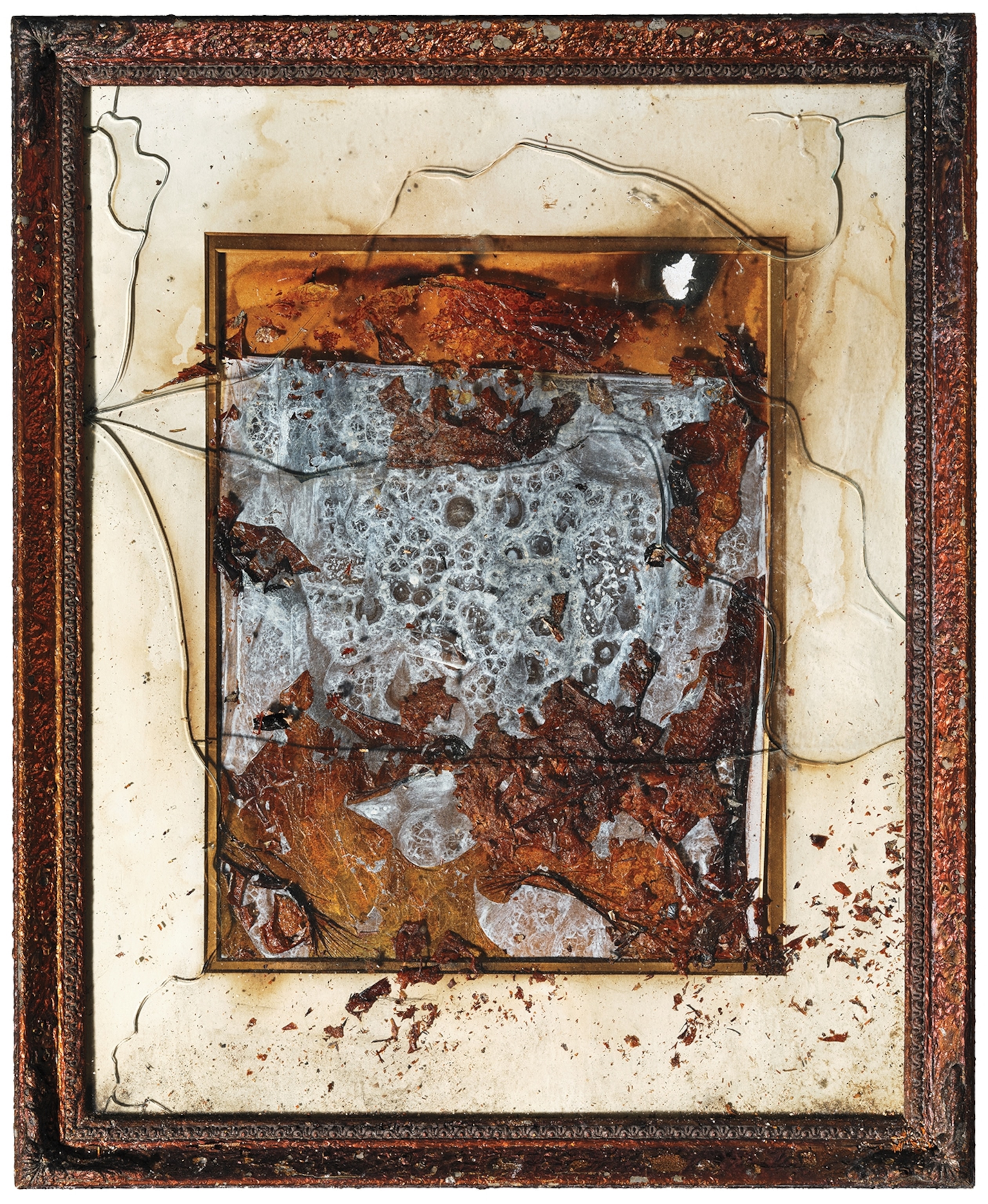 Salvaged from the ruins of Corpus Christi Church in Pacific Palisades, this frame once held a photo of the current archbishop of Los Angeles, José H. Gómez.