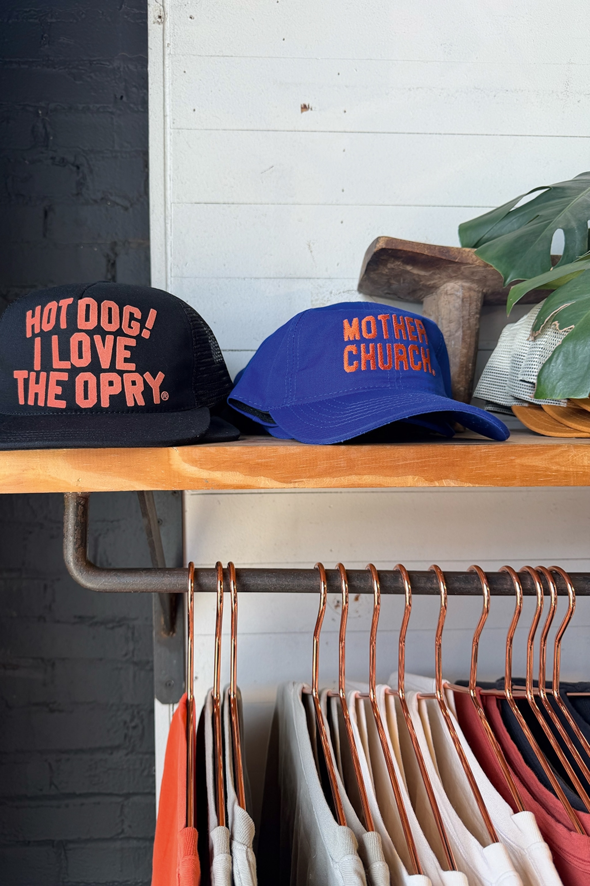 Hats and clothes in a shop.