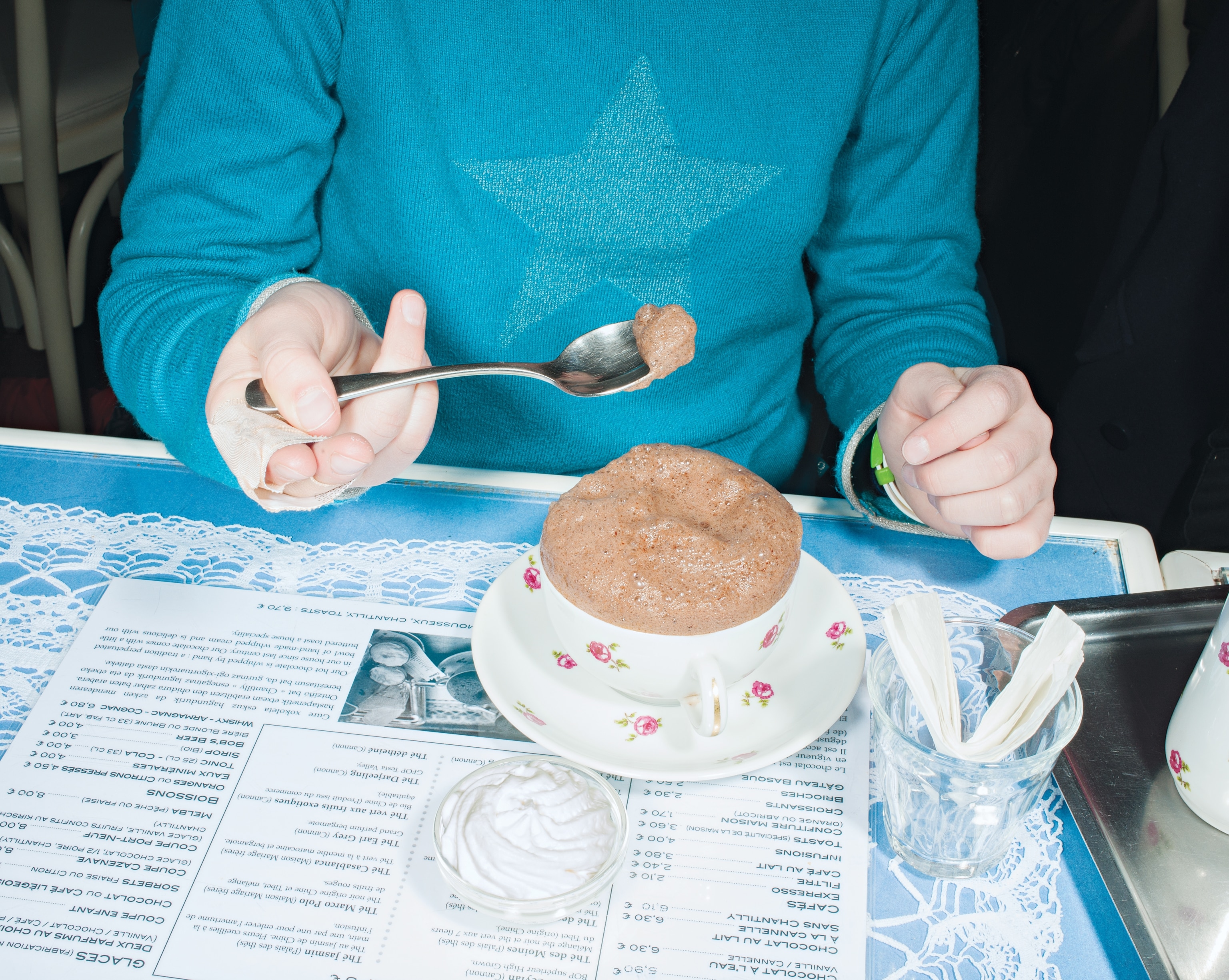 foam topping a cup of hot chocolate at Cazenave in Bayonne, France