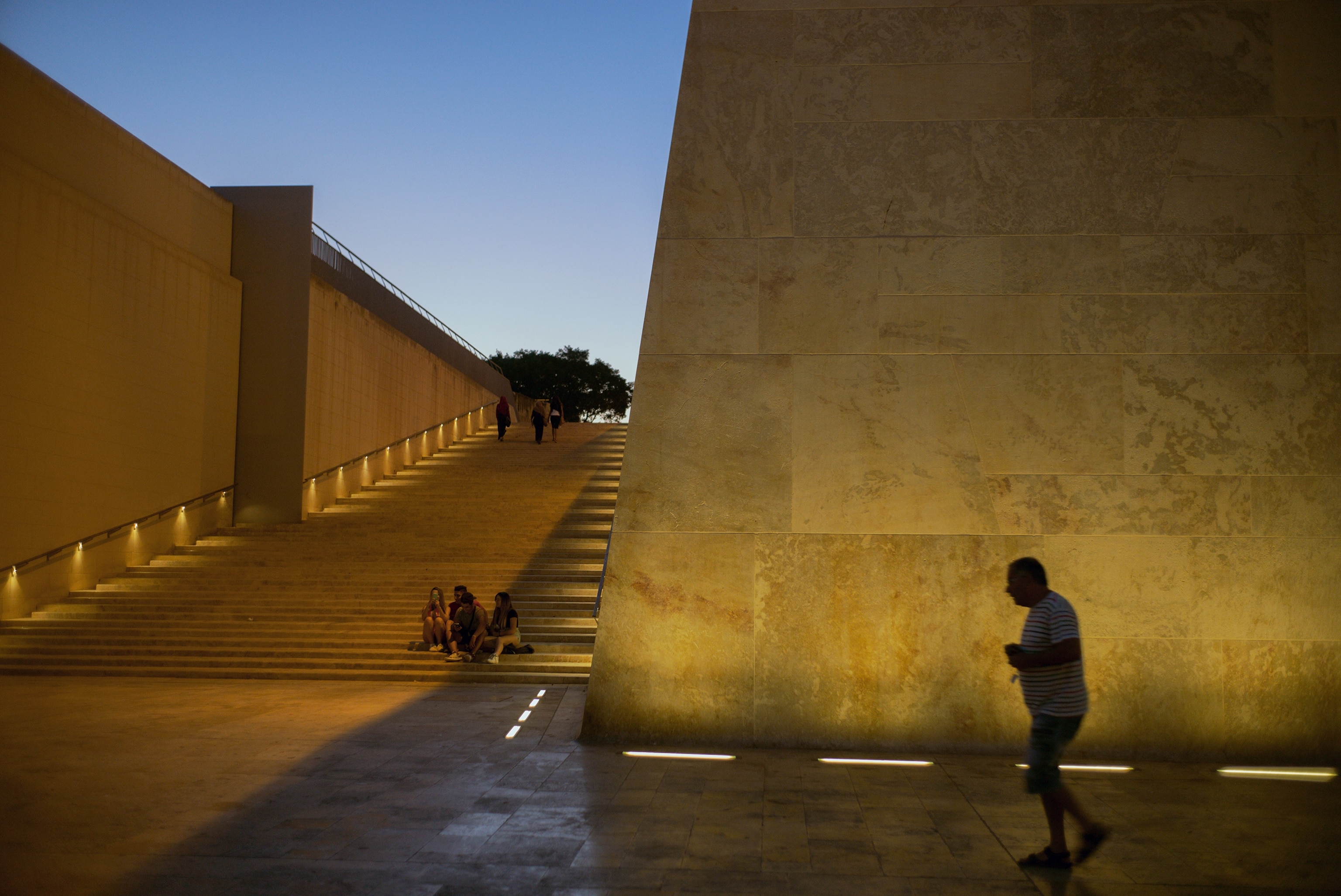 people visiting the parliament and city gate complex, Malta