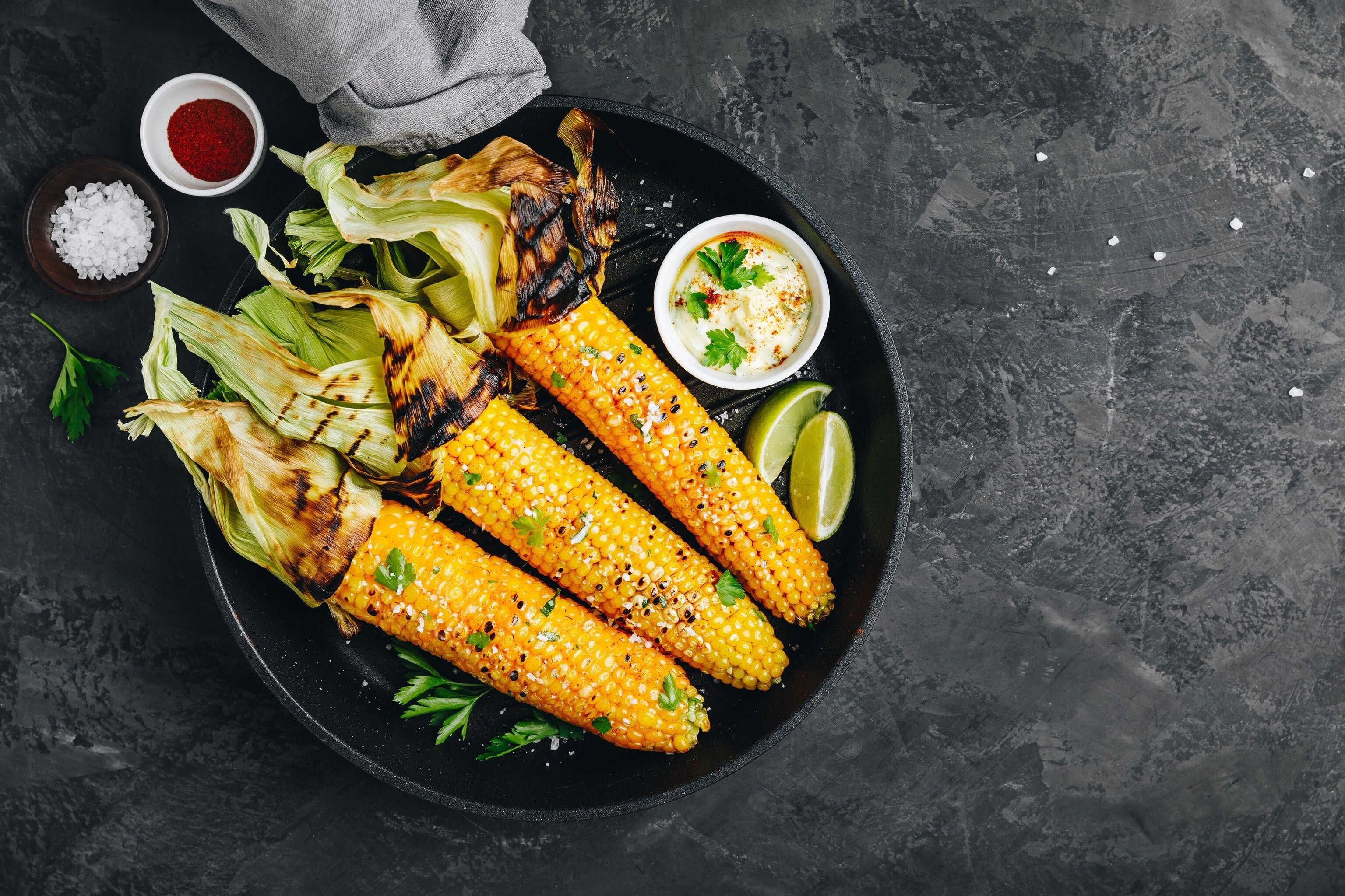 In Japan, sweetcorn skewers are dusted with shichimi togarashi, a spicy seasoning made with citrus peel, sesame, seaweed and sansho pepper.