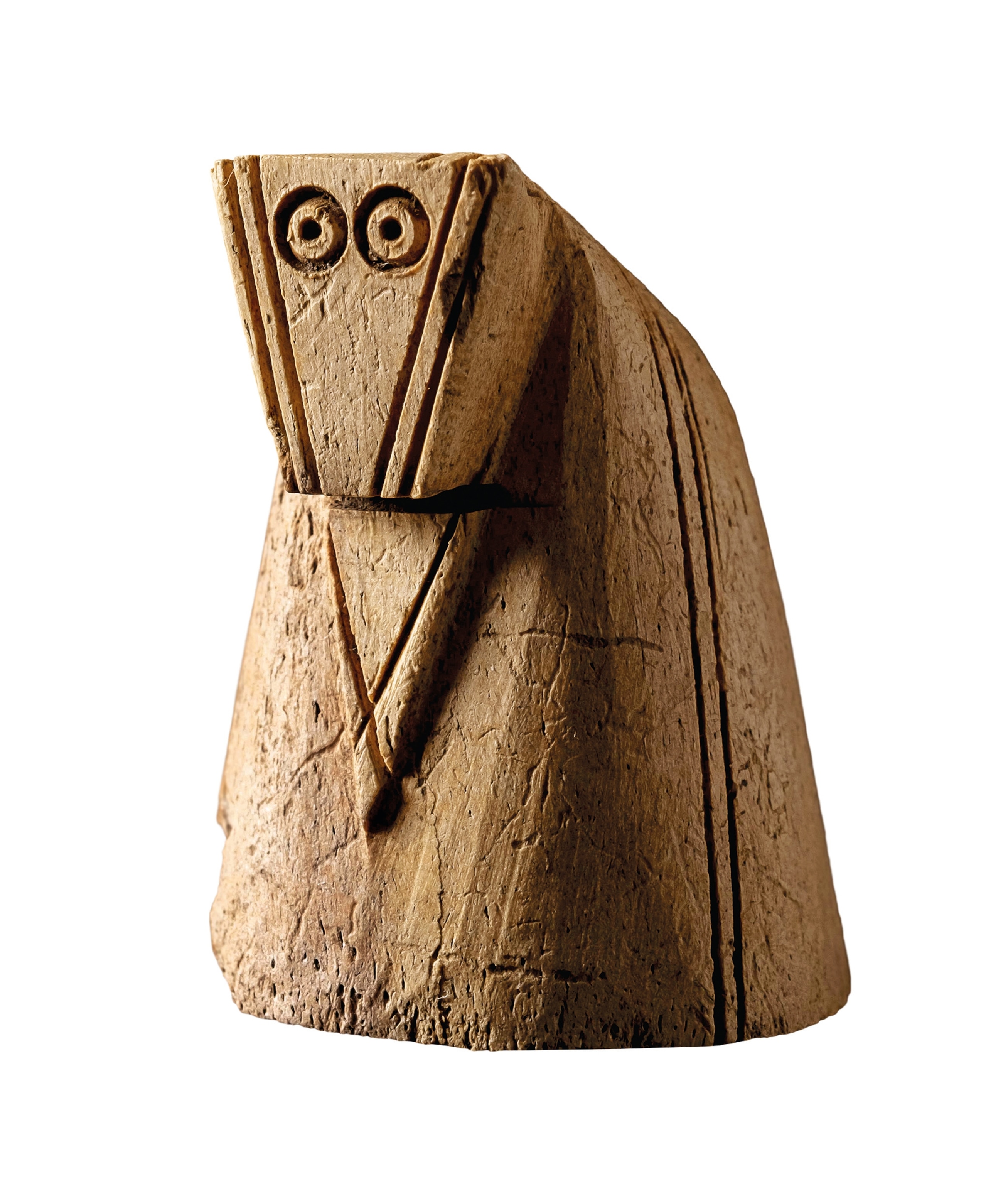 A knight piece carved from antler is pictured.