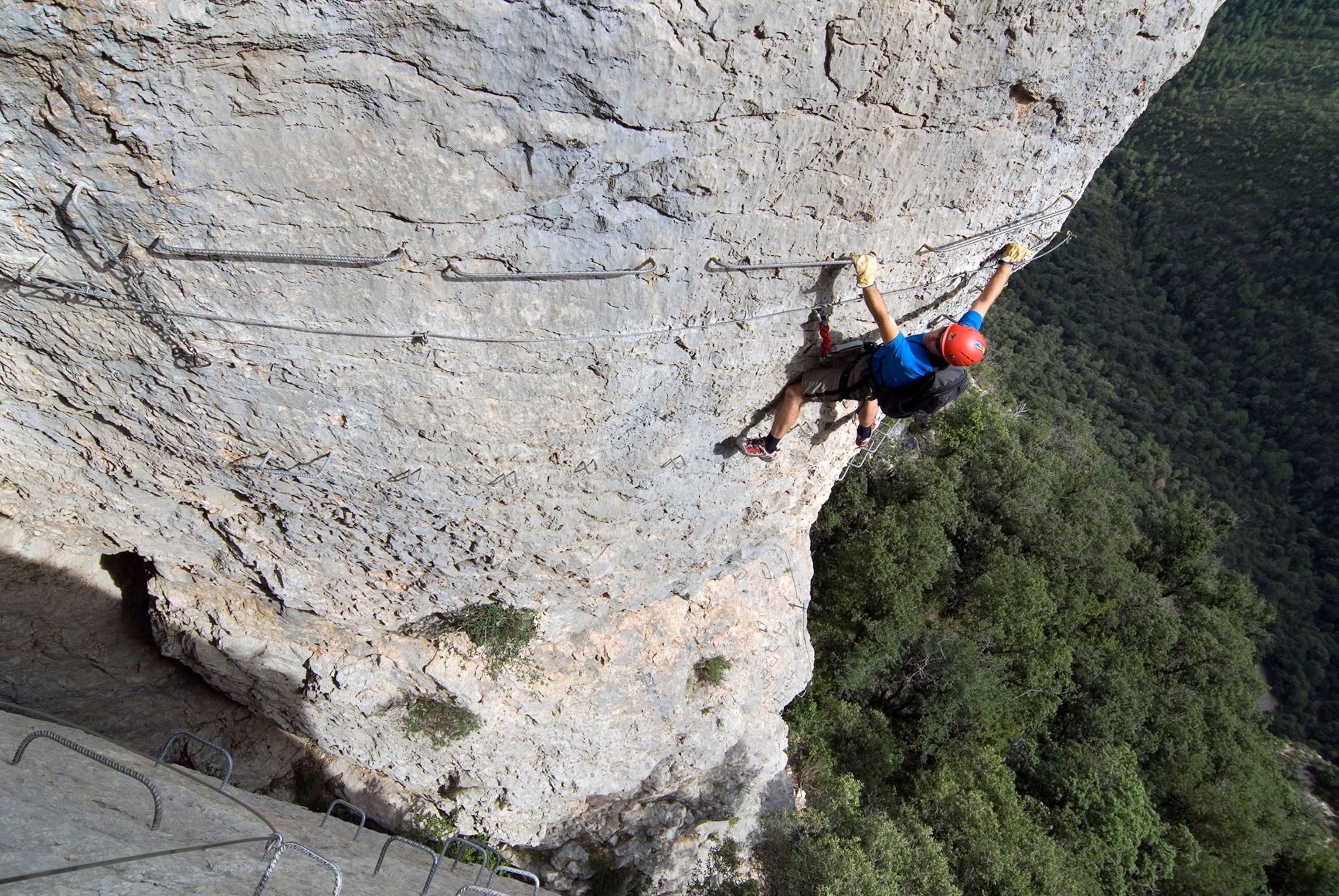 a climber on a via ferrata in Catalonia, Spain