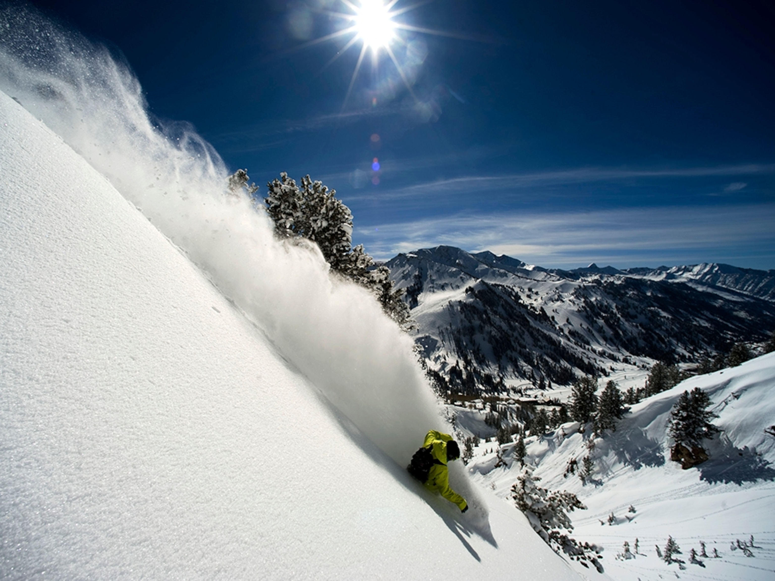 a man snowboarding near the Alta Ski Resort