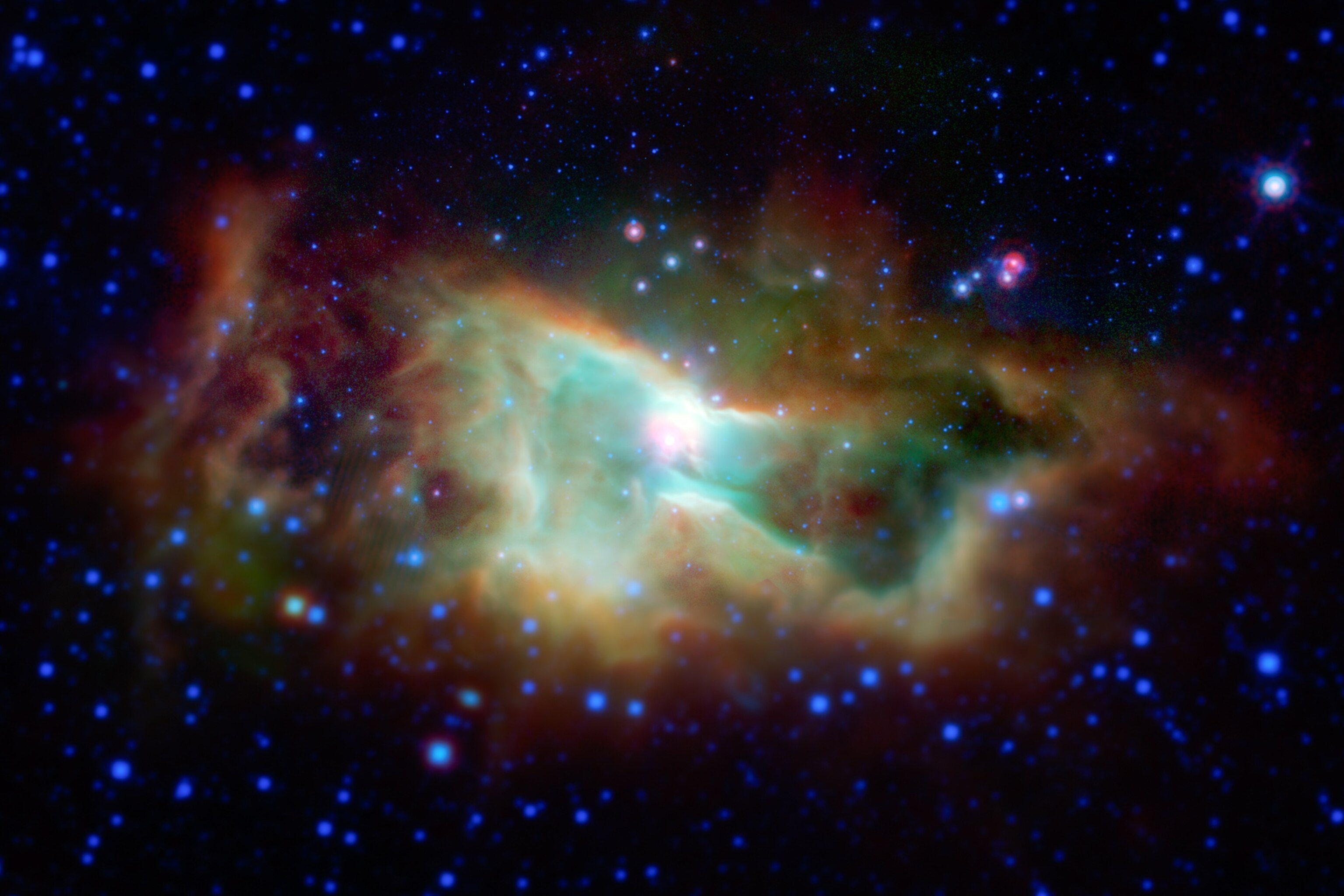 young stars in the Iris Nebula taken by NASA's Spitzer Space Telescope