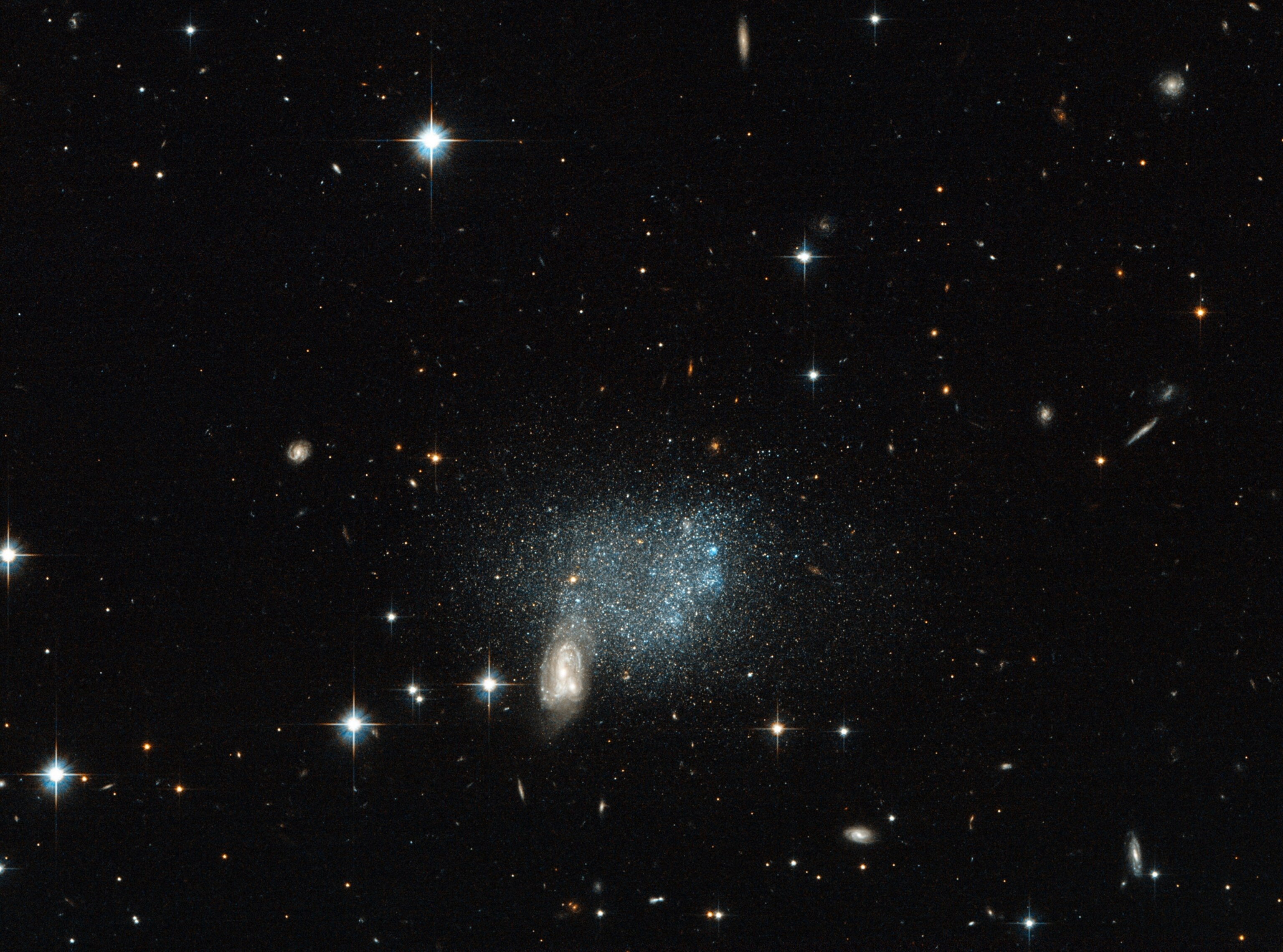 distant dwarf galaxies colliding.