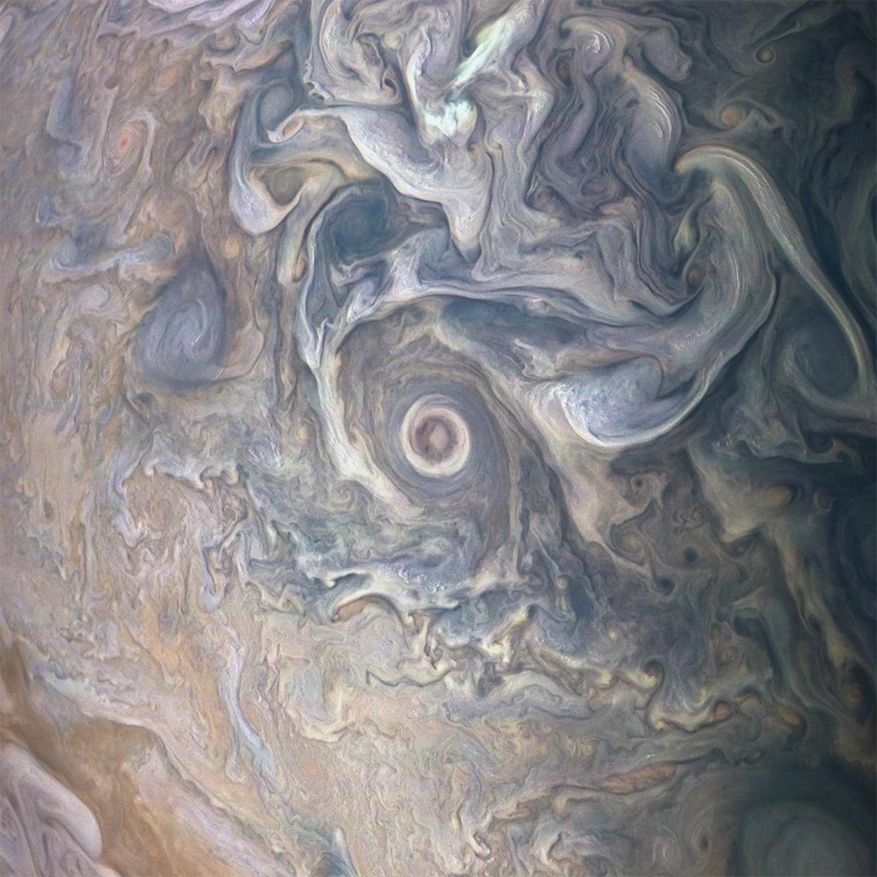 the intricate swirls in Jupiter's volatile northern hemisphere
