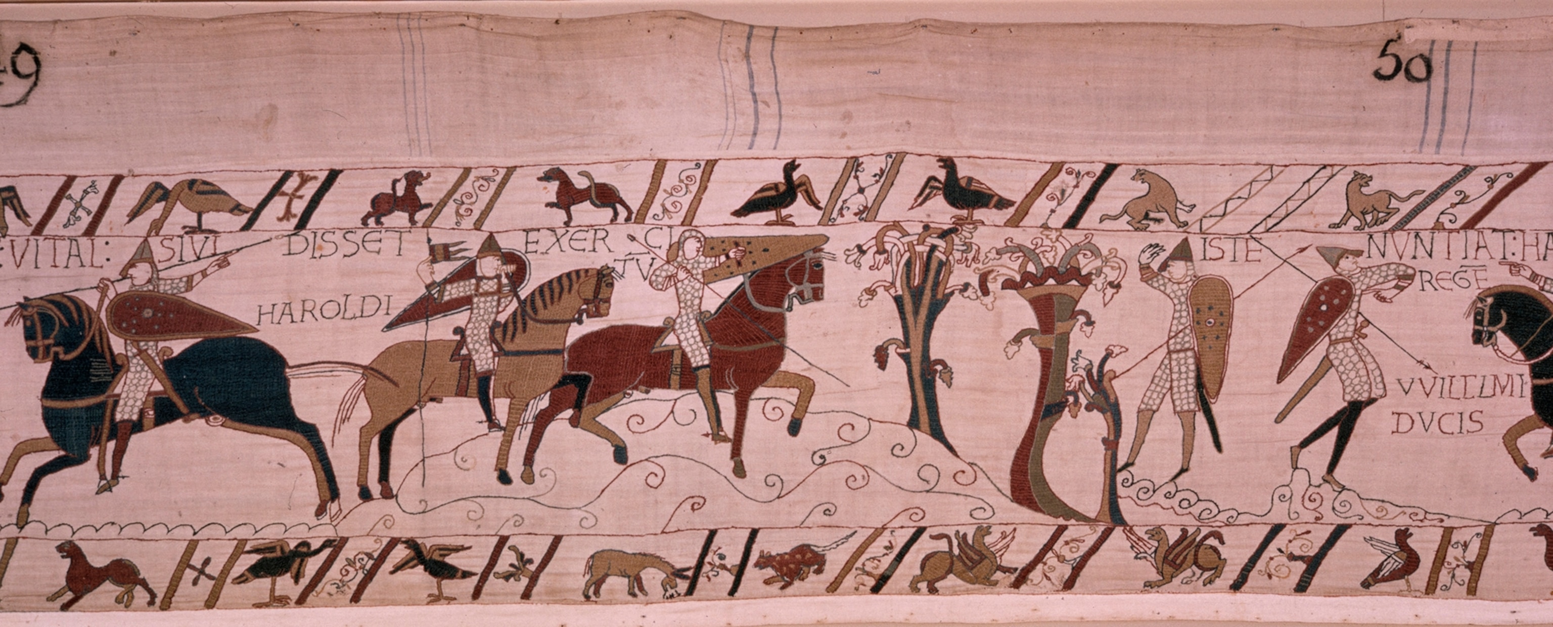 A scene from the tapestry in which swarming armies converge.