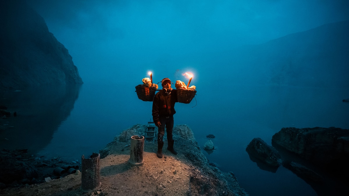 Striking Photos of the Men Who Work in an Active Volcano