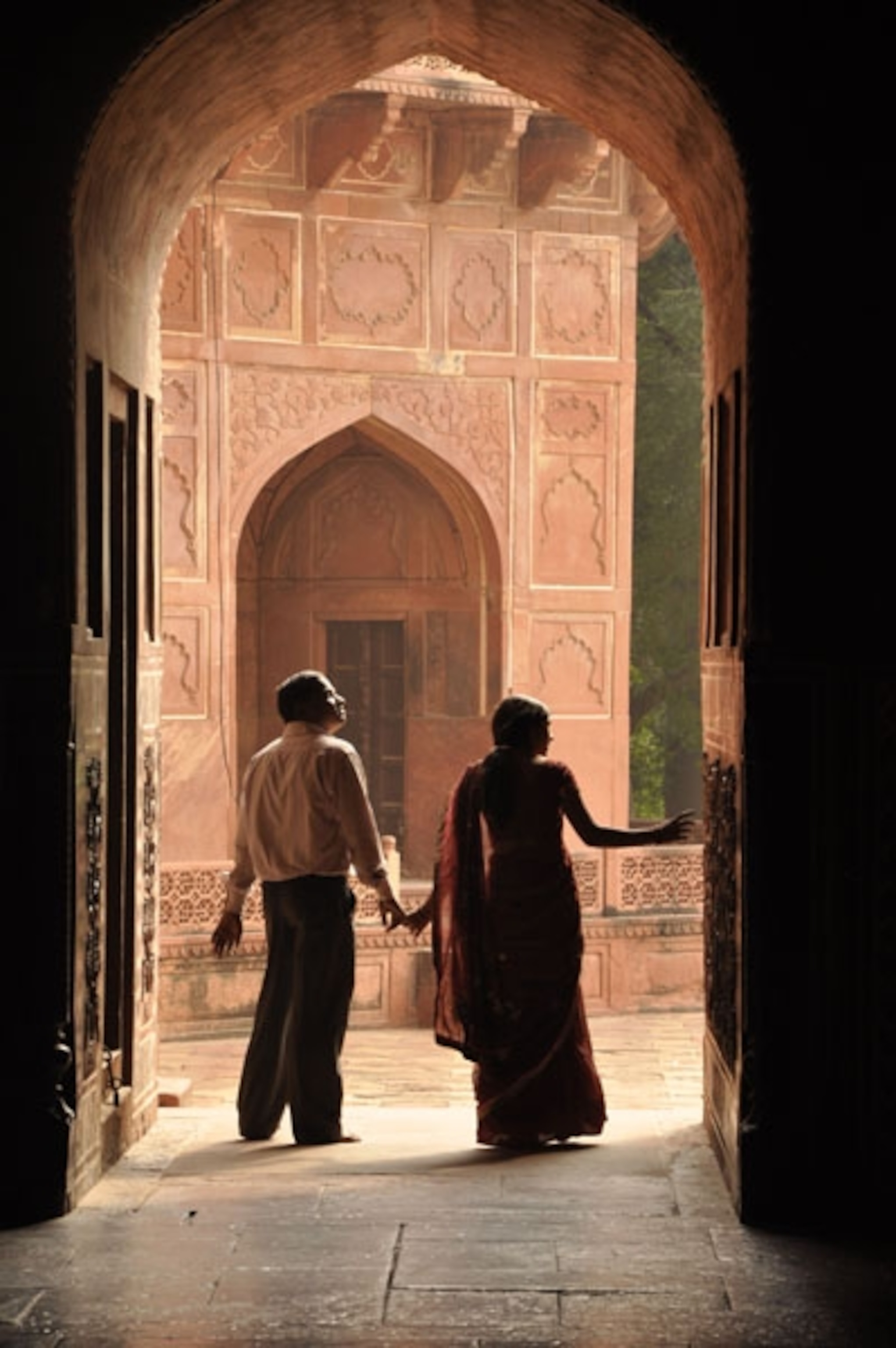 Couple in doorway at Agra Tac Mahal