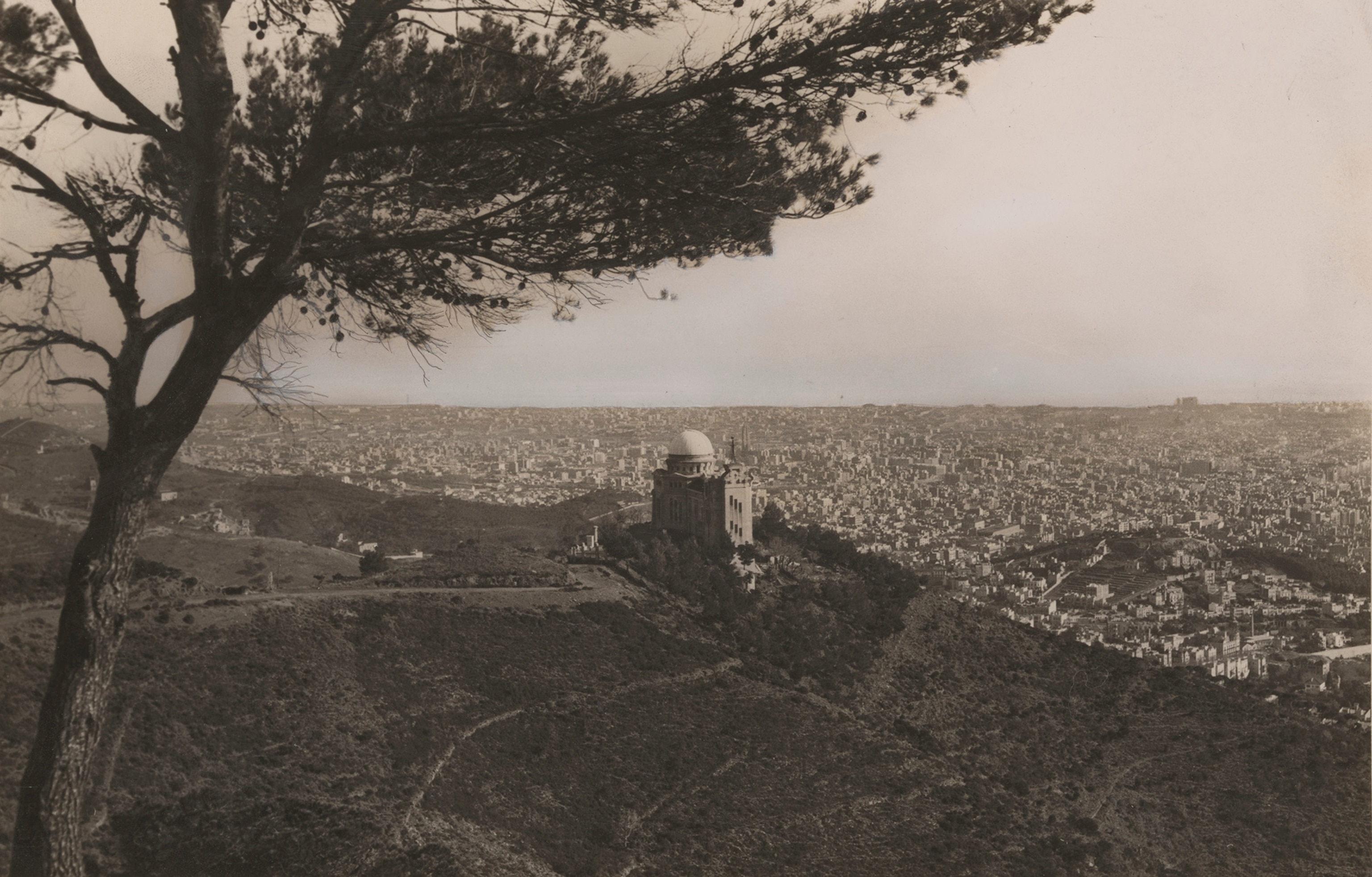 An astronomical observation dome overlooks Barcelona.