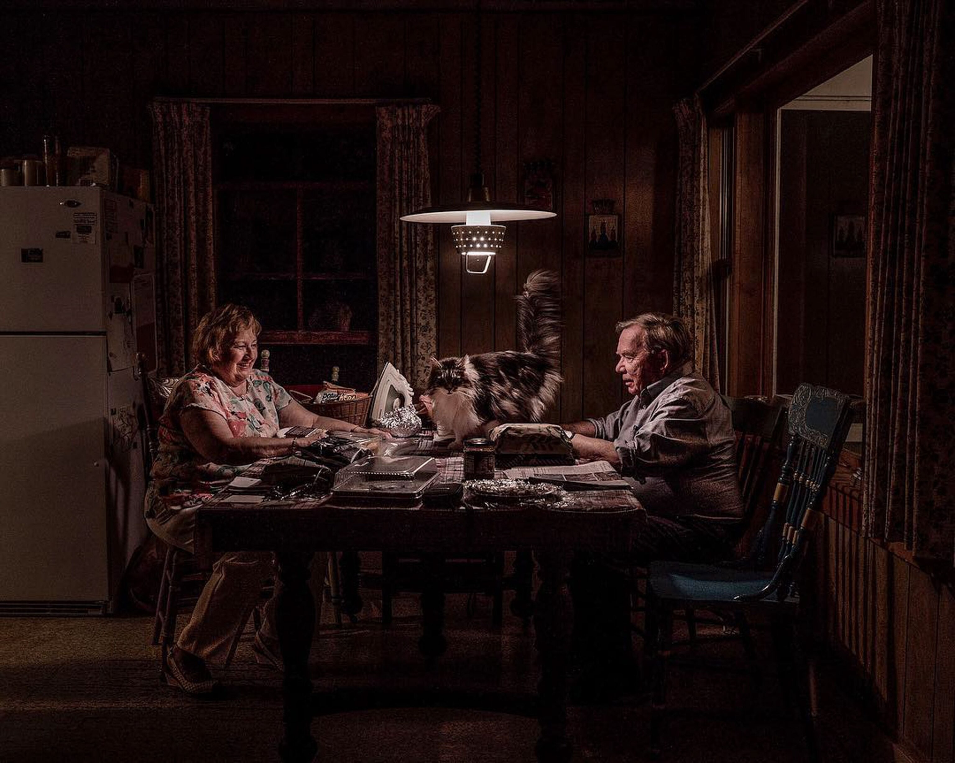 a man and a woman sitting at a table