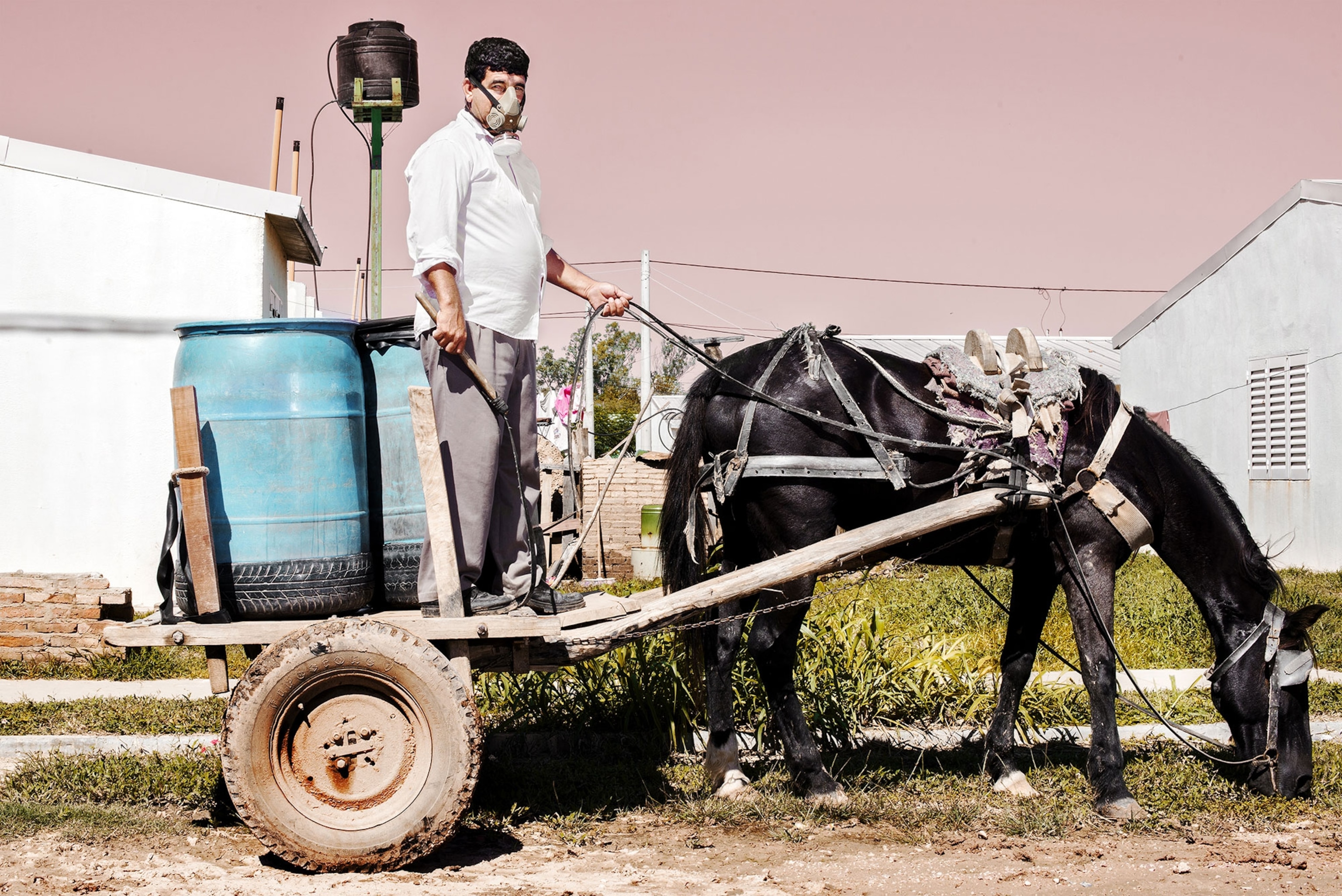 a man delivering water in Avia Terai, Argentina.