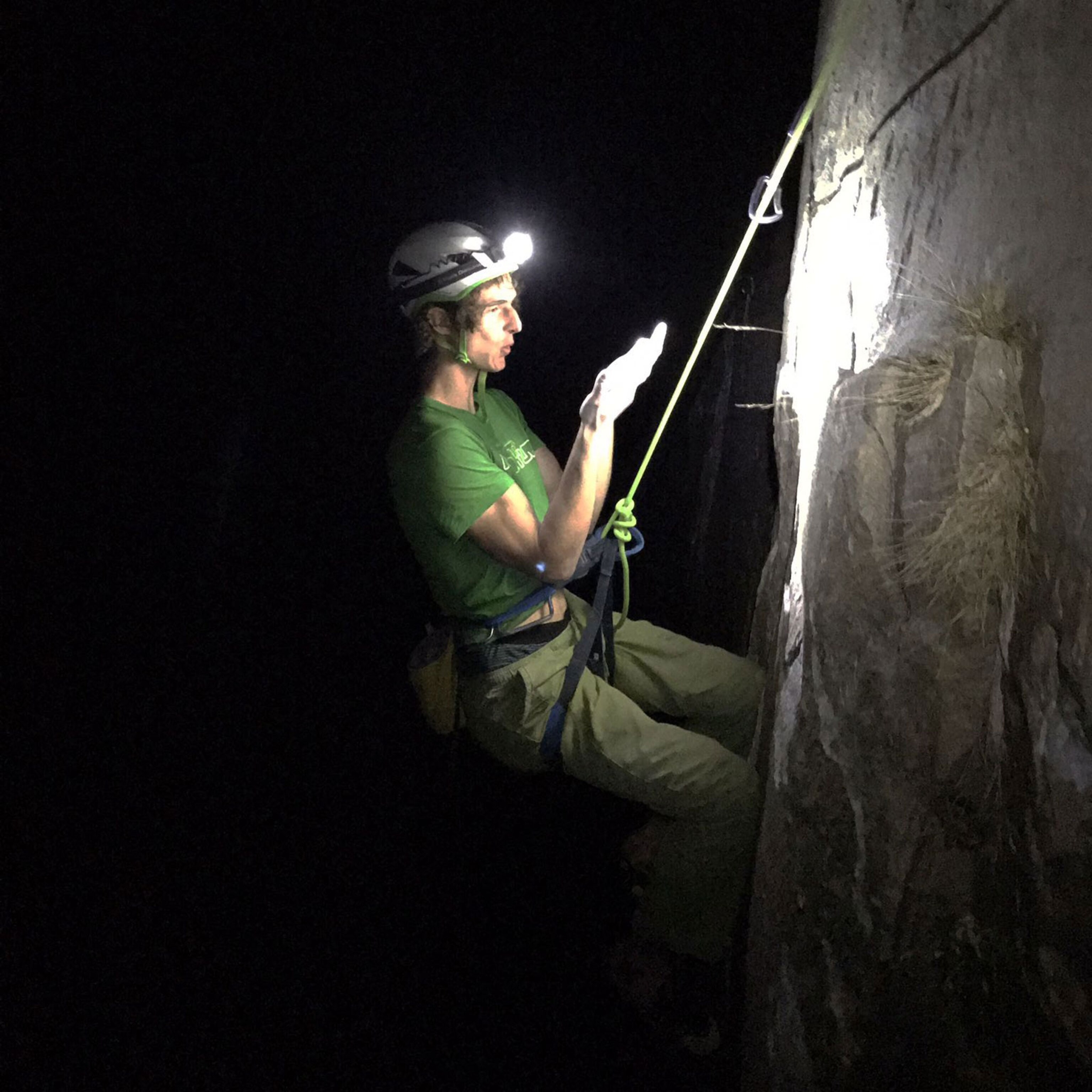 Adam Ondra climbing at night