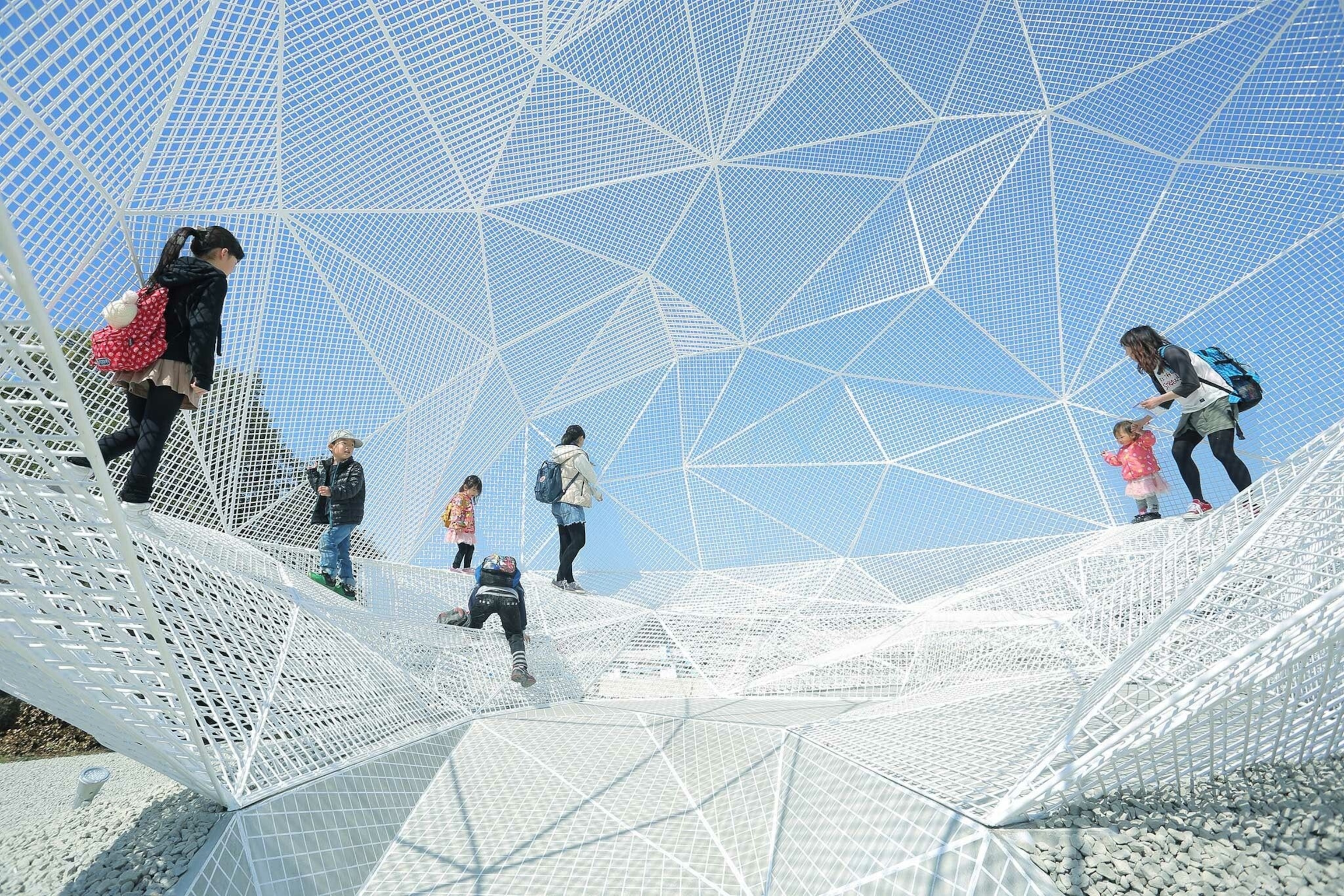 Interactive artworks like the intriguing Naoshima Pavilion, created by the Sou Fujimoto Architects, can be found at Setouchi Triennale, one of the largest art festivals in Japan.